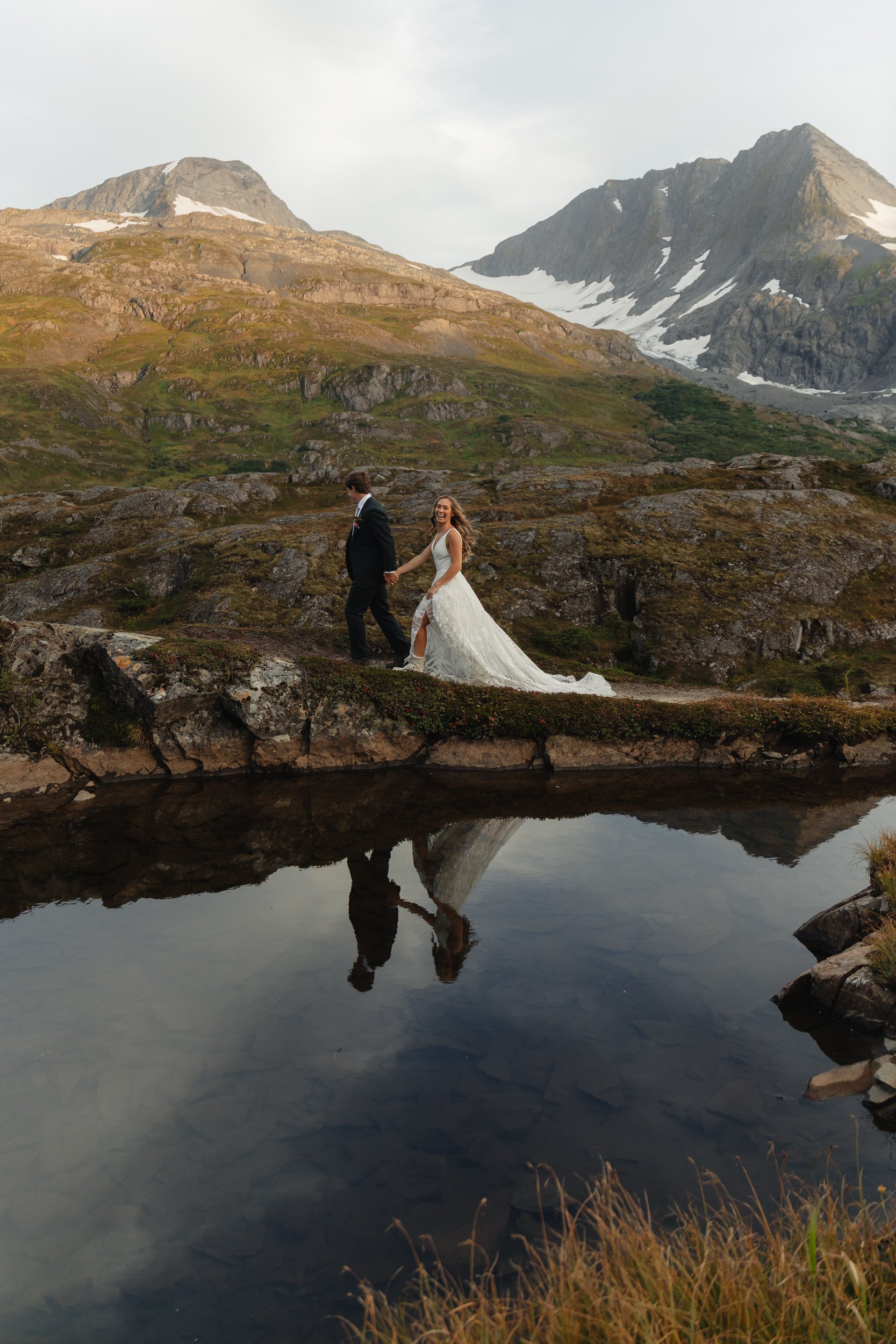 Hiking mountain top elopement in Alaska surrounded by glaciers | the hearnes adventure photography