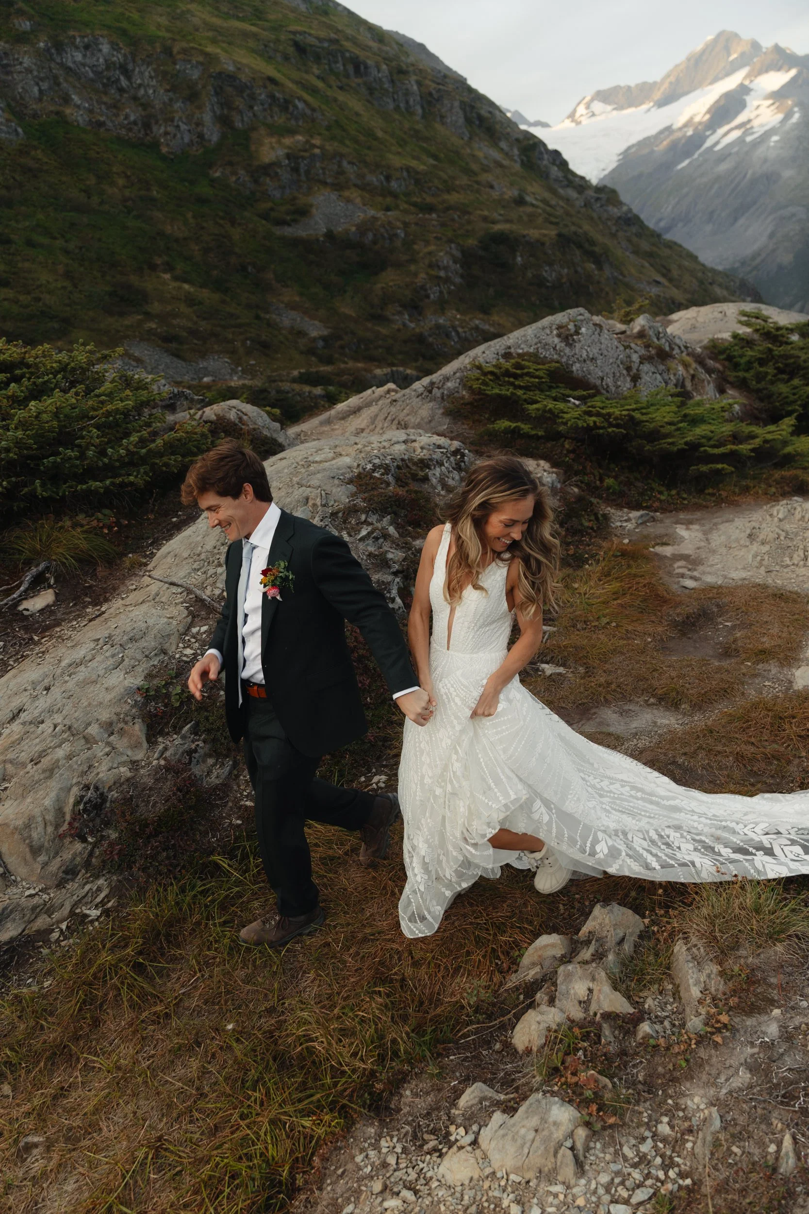 Hiking mountain top elopement in Alaska surrounded by glaciers | the hearnes adventure photography