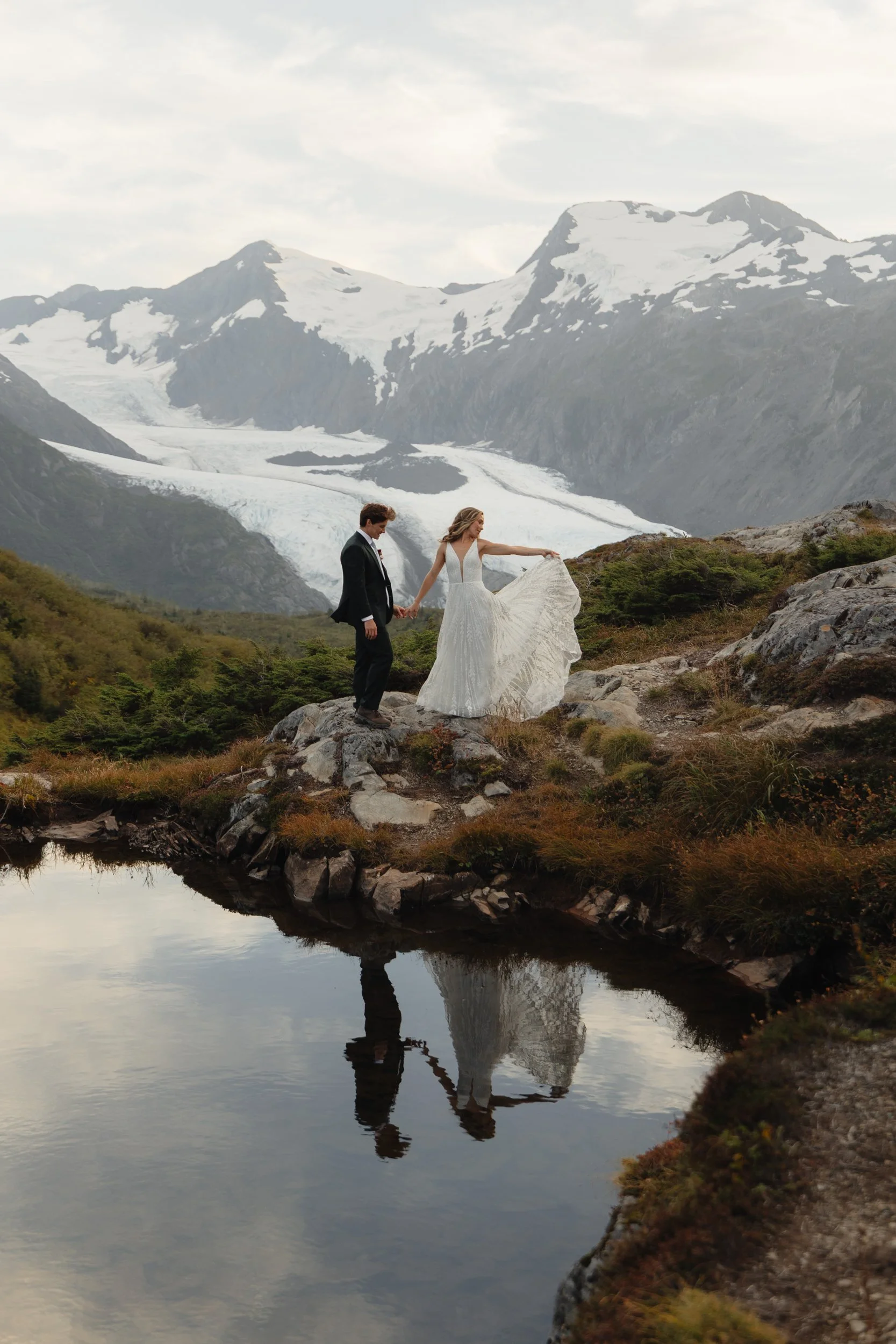 Hiking mountain top elopement in Alaska surrounded by glaciers | the hearnes adventure photography