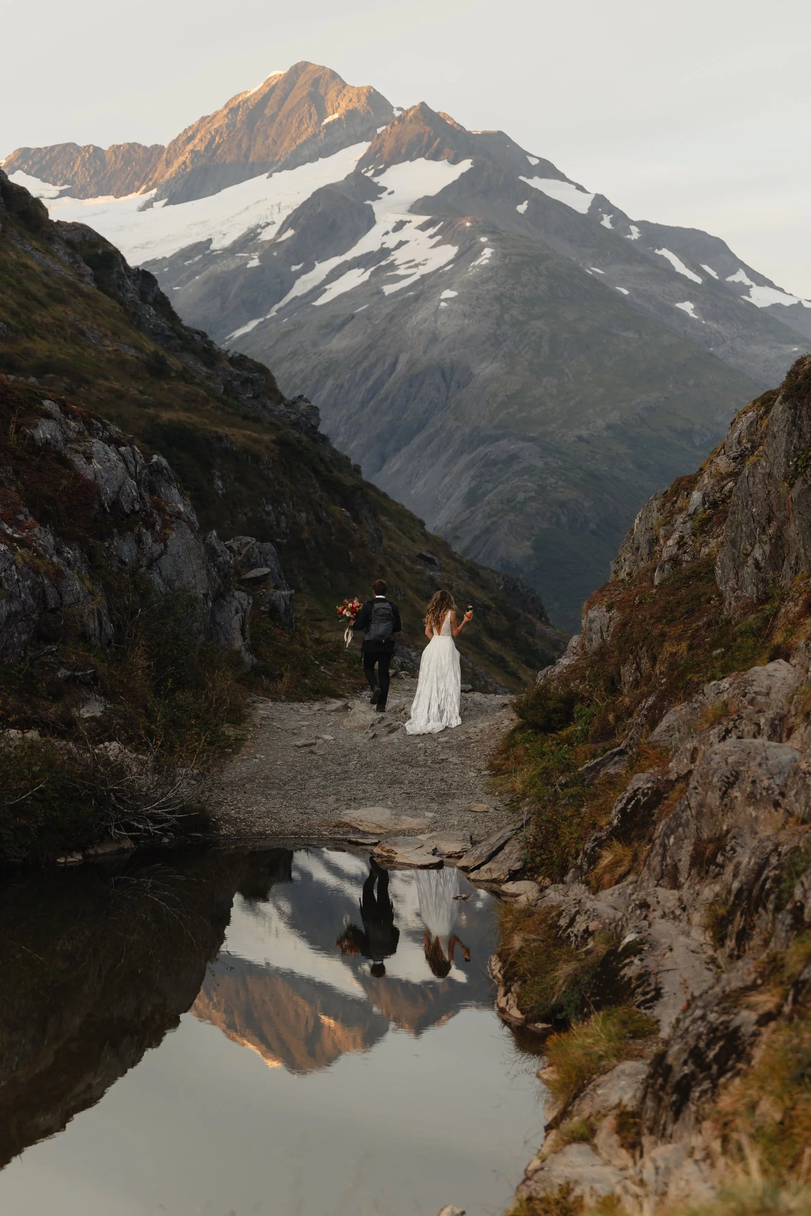 Hiking mountain top elopement in Alaska surrounded by glaciers | the hearnes adventure photography