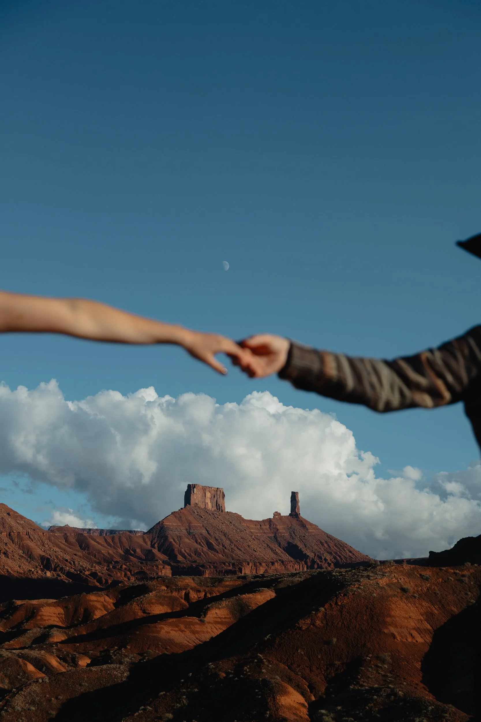 western Engagement portrait session in Moab Utah with a dog