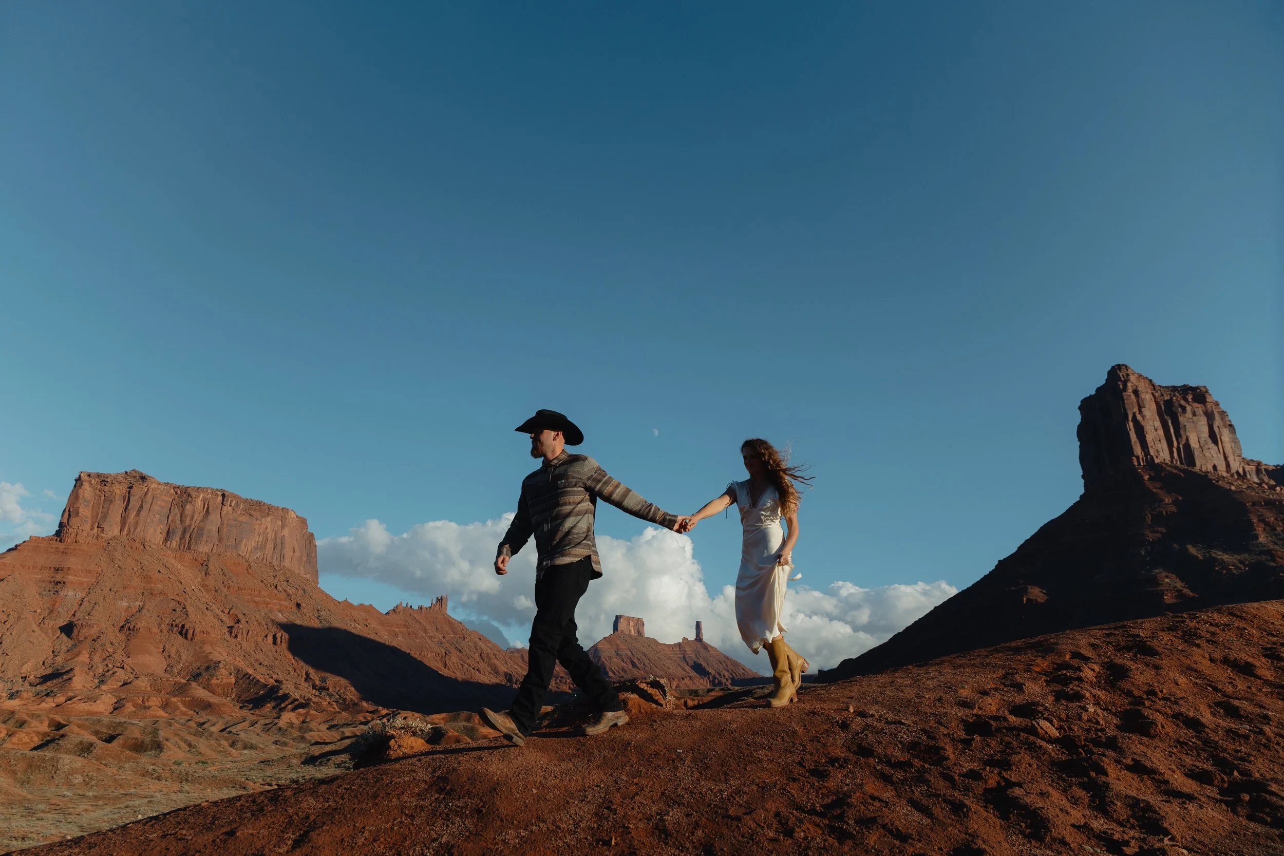 western Engagement portrait session in Moab Utah with a dog