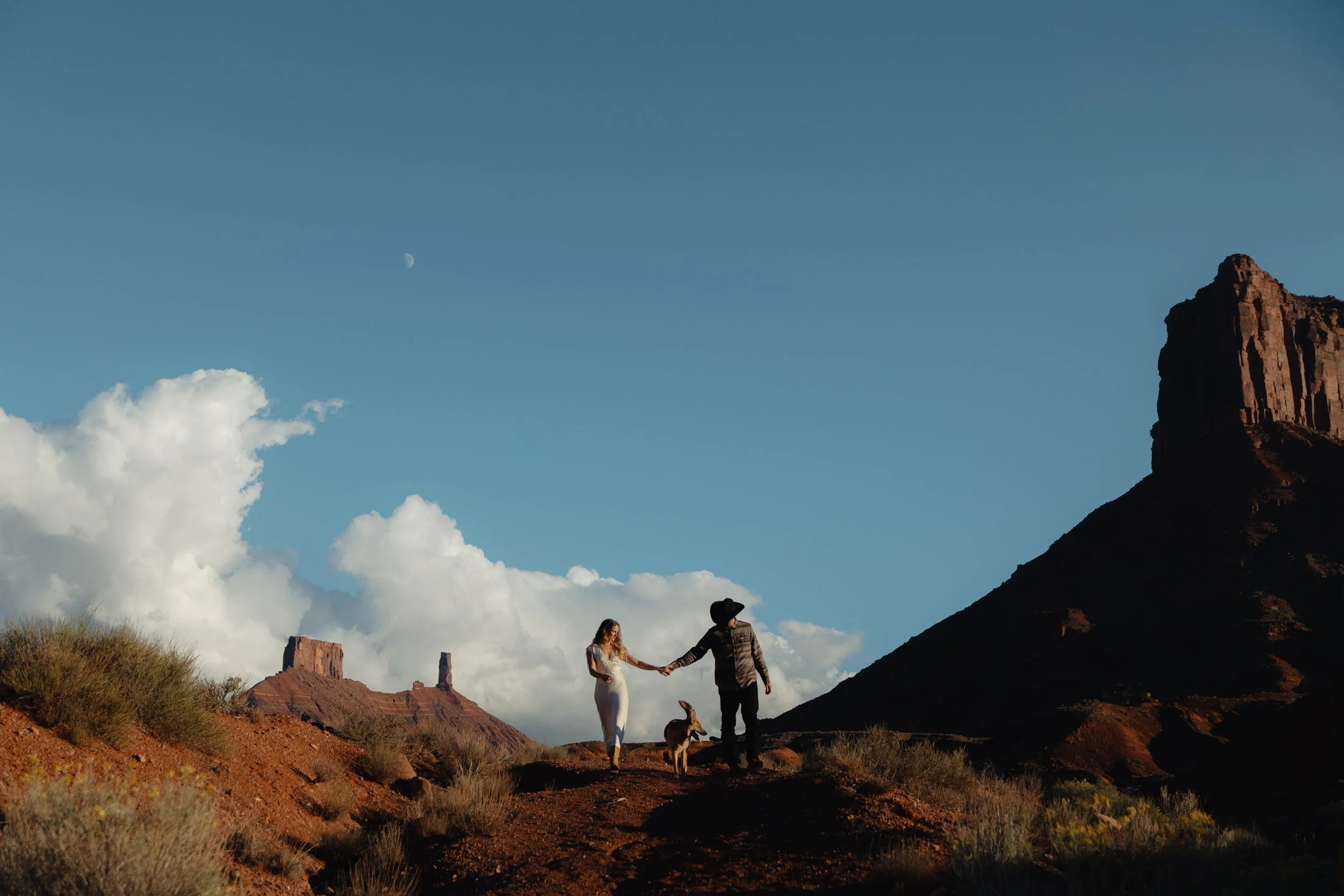 western Engagement portrait session in Moab Utah with a dog