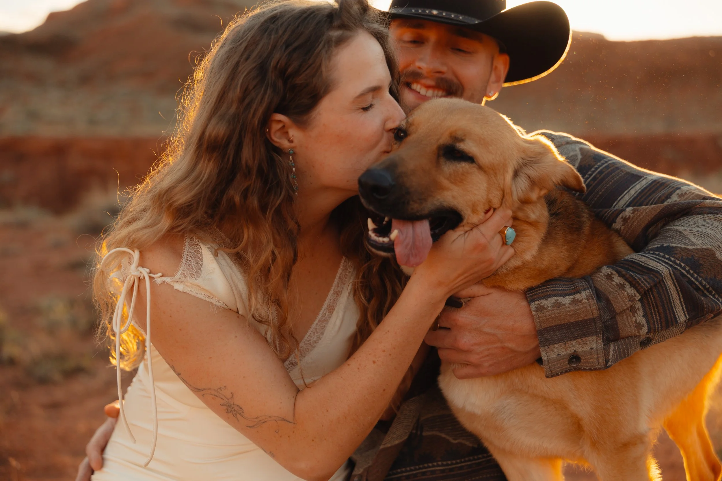 western Engagement portrait session in Moab Utah with a dog