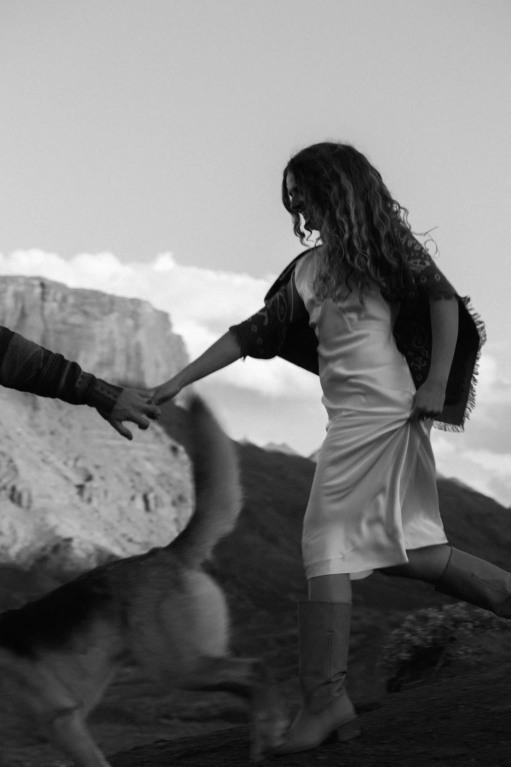 western Engagement portrait session in Moab Utah with a dog