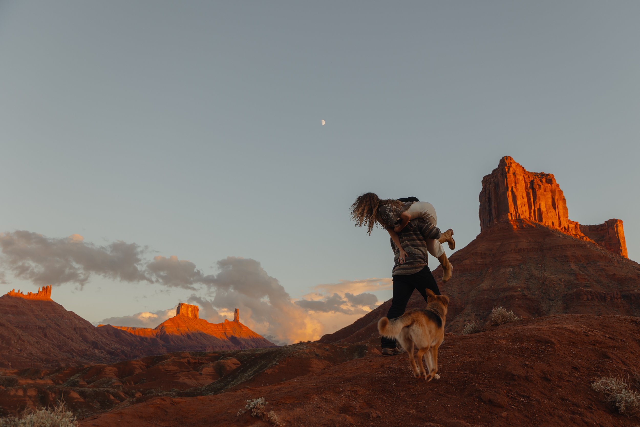 western Engagement portrait session in Moab Utah with a dog