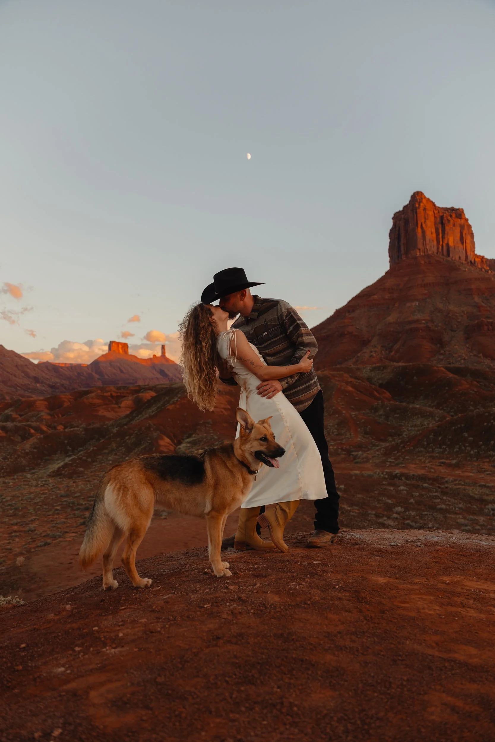 western Engagement portrait session in Moab Utah with a dog