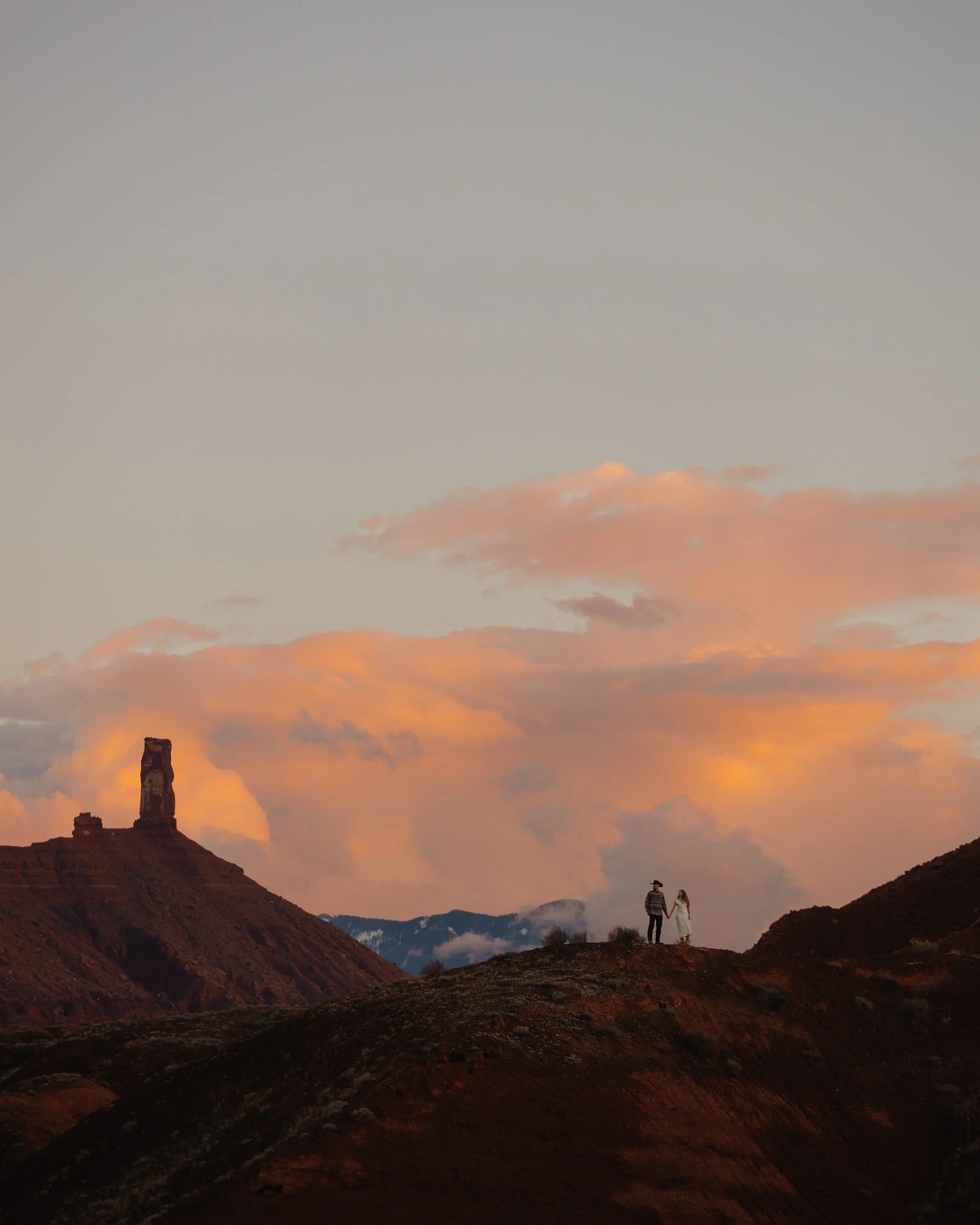 western Engagement portrait session in Moab Utah with a dog