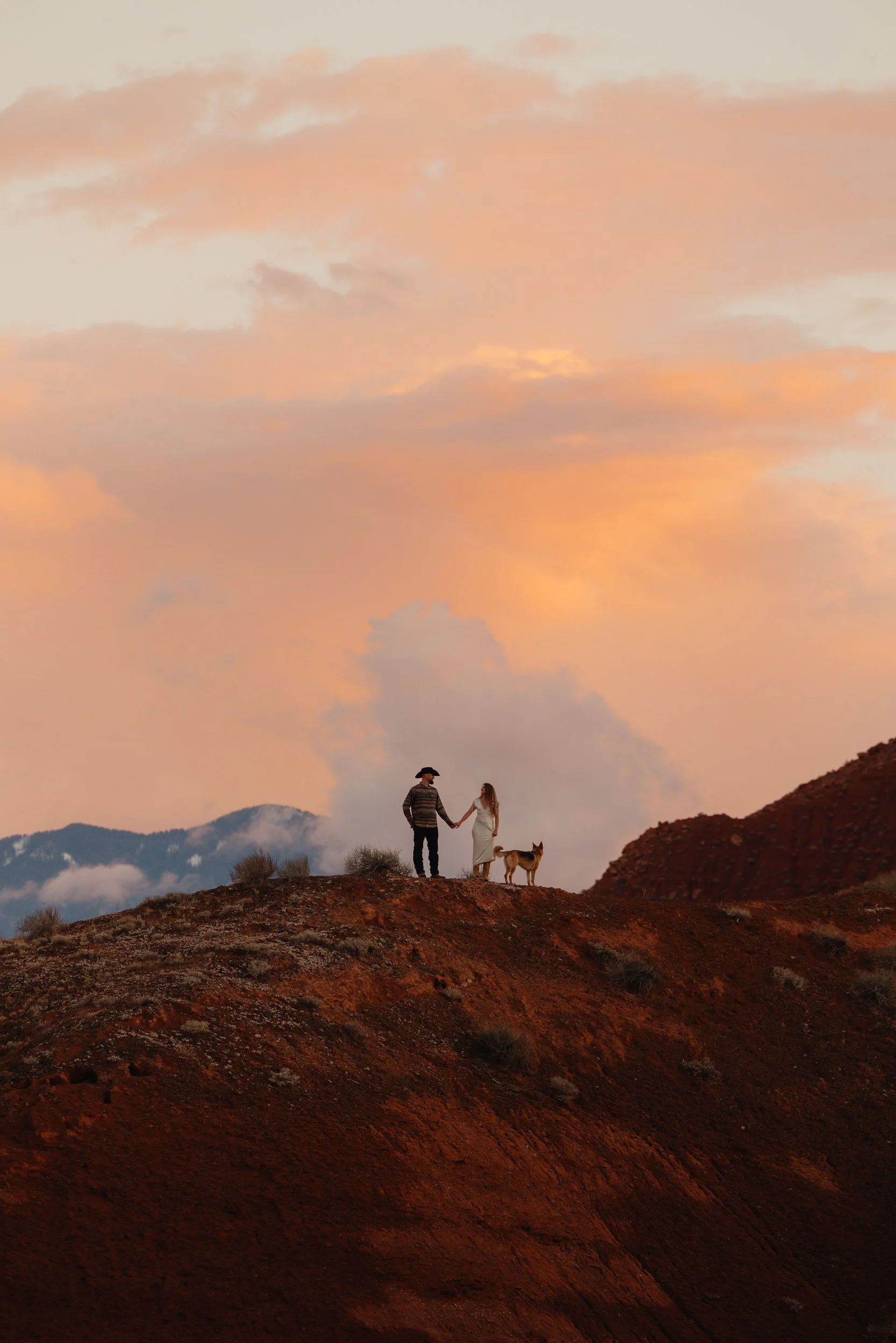 western Engagement portrait session in Moab Utah with a dog