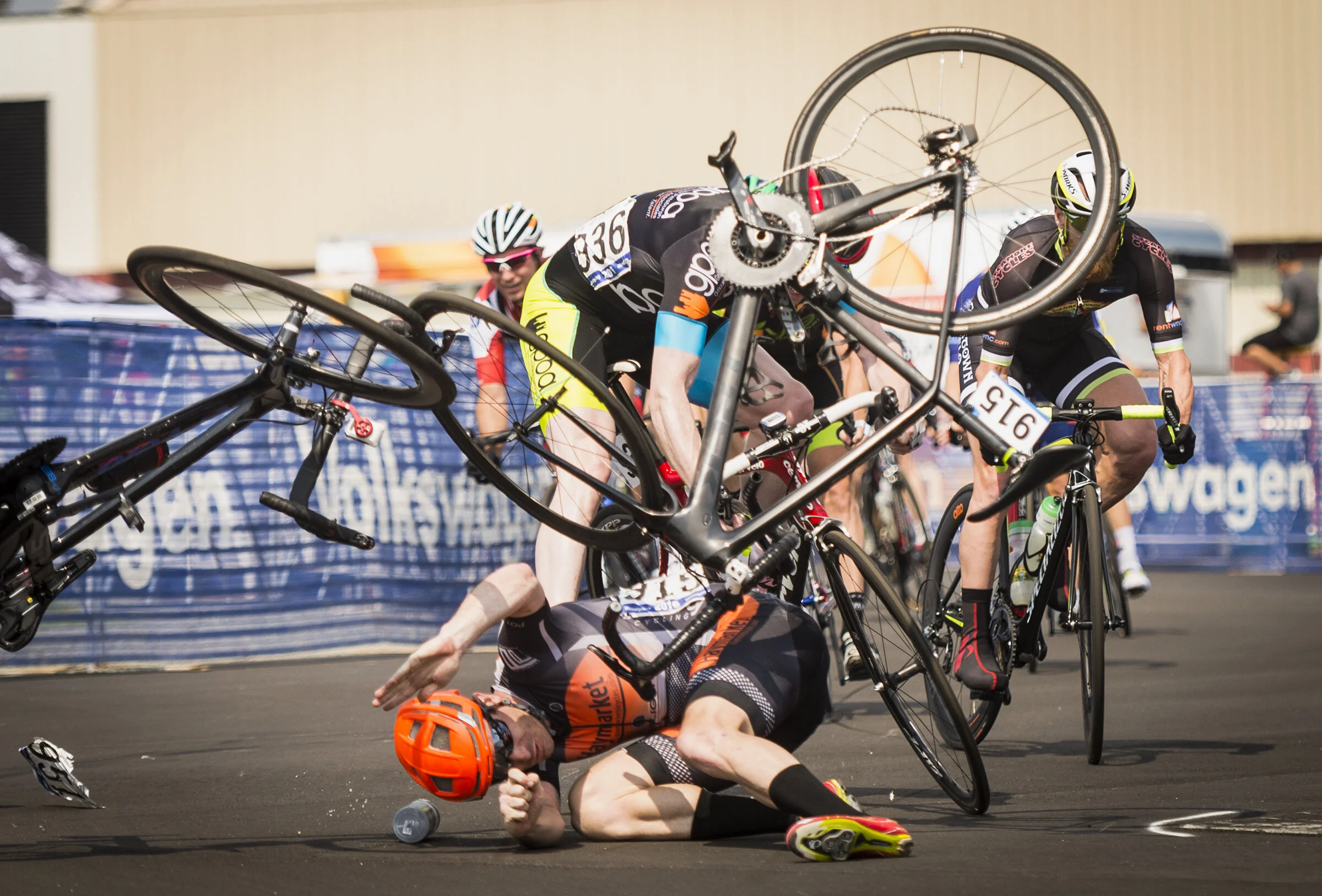  Gregory Capelle of Catonsville, Md., takes a spill after a collision with Brad Loyd in one of the turns during the Men's 35-39 criterium race on Thursday, May 26, 2016 at the Dixie Classic Fairgrounds. 
