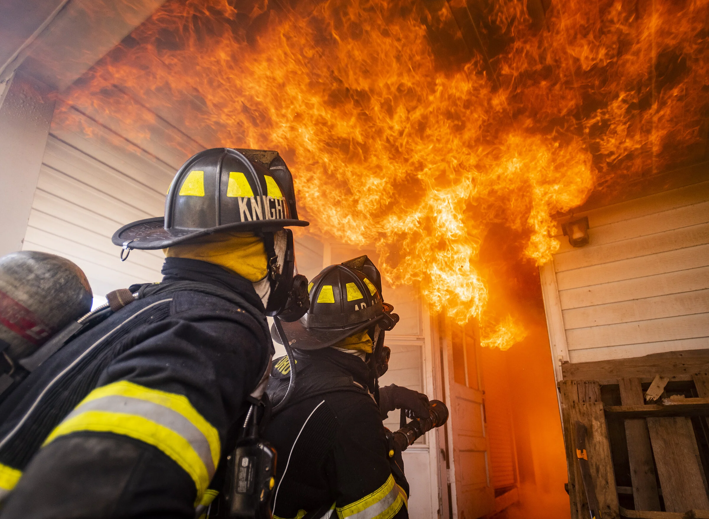  Recruits with Winston-Salem Fire Department recruit class XXVII, from left, Antinain Knight and Ethan Adams prepare to attack a fire during fire control training on Wednesday, Feb. 13, 2019 in East Bend, N.C. 