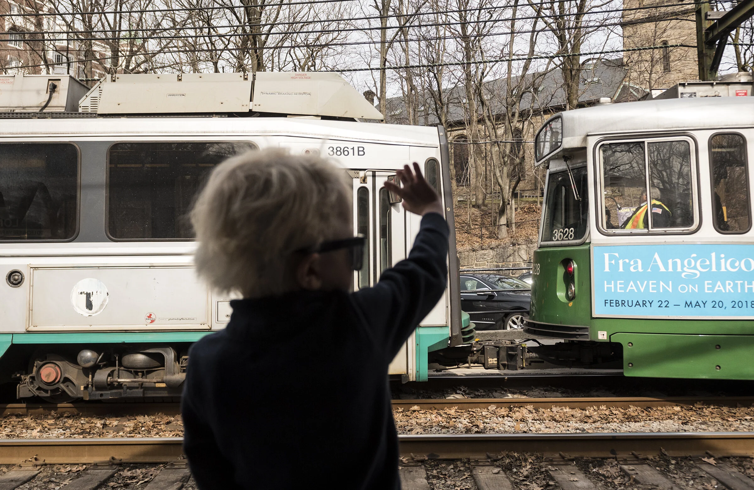  Cam Elliot waves at a train during a visit to Boston to attend appointments at Boston Children's Hospital on Thursday, March 29, 2018 in Boston, Ma. Cam has to travel to Boston a few times a year to see specialist surgeons and doctors. 