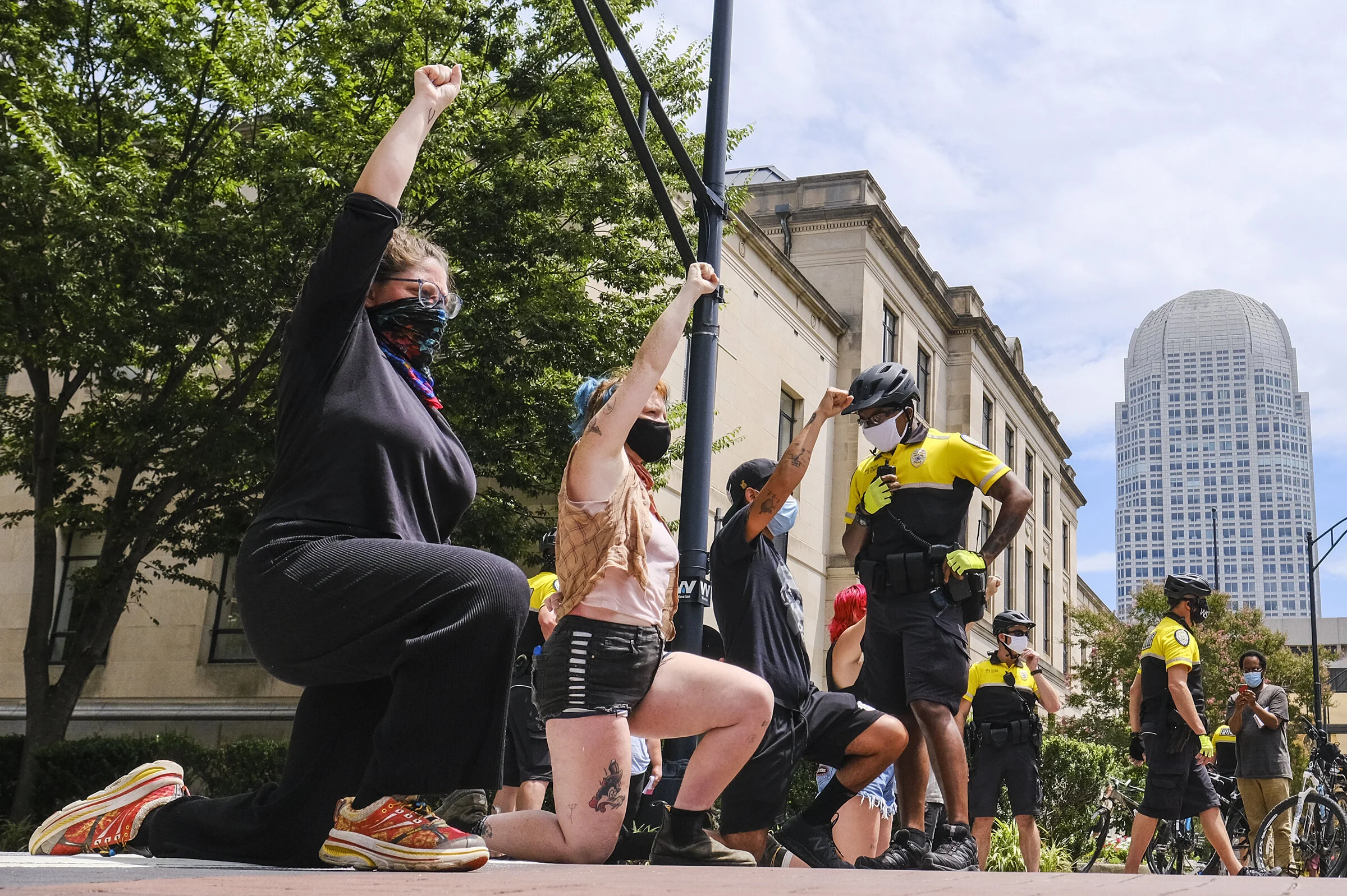  Officers with the Winston-Salem Police Department ask demonstrators to move from Fourth Street, explaining that they will be arrested if they stay on Friday, July 24, 2020 in Winston-Salem, N.C. Demonstrators chose to be arrested in an act of civil 