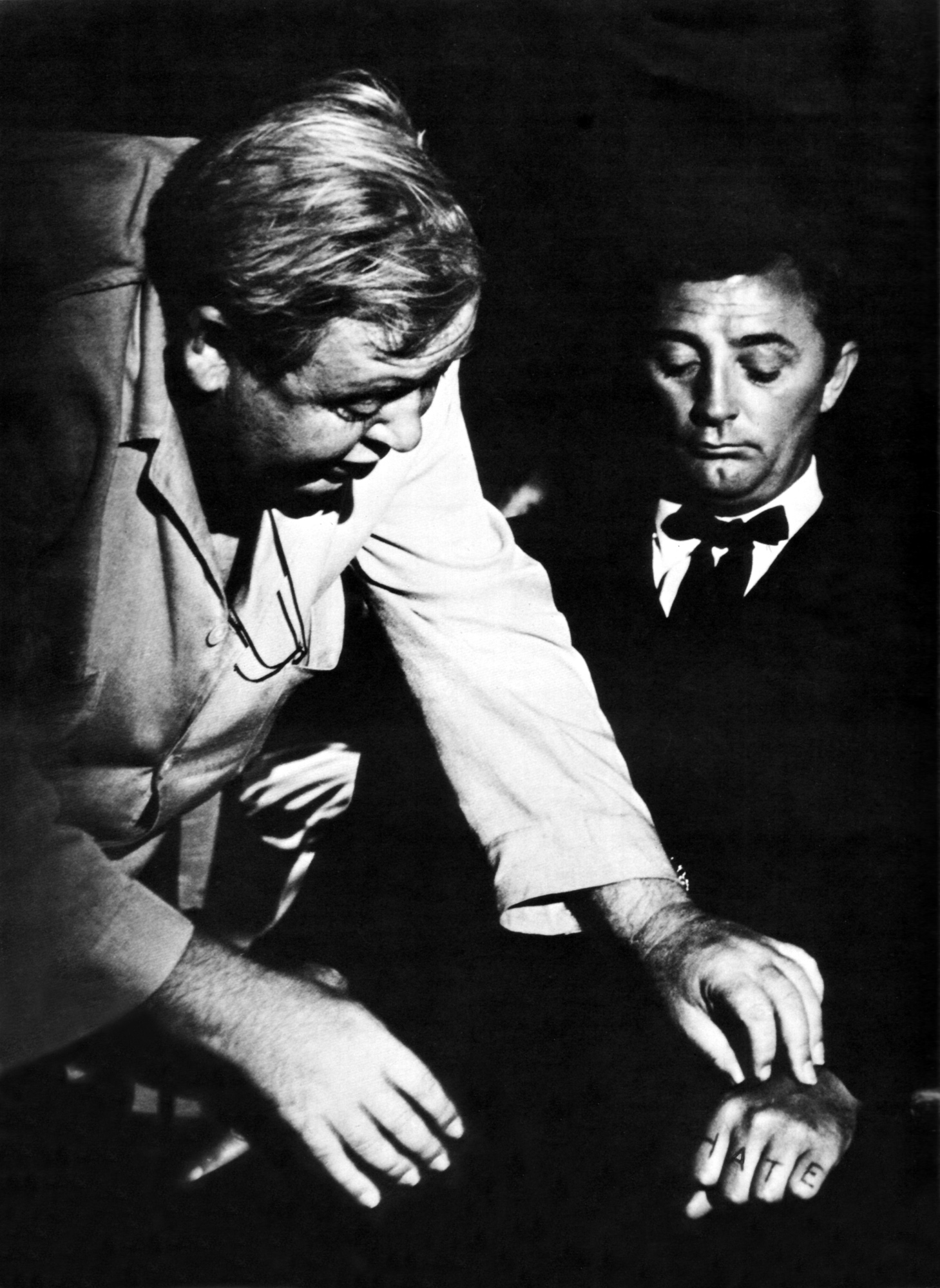 Charles Laughton-Annex With Robert Mitchum (R) on the set of The Night of the Hunter, Image Source