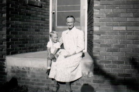 My mother wrote, “about 1949 with Grandma Wurster who was staying with her daughter Lillian Means. Her hometown was Lenox, Iowa. She & Craig had a mutual love affair.” Note the lack of front steps.