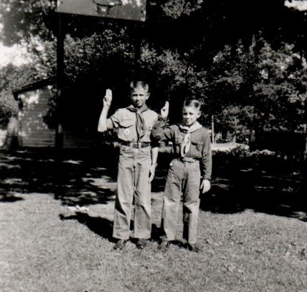 Kenny as Boy Scout with 3-finger salute about 1957 or 1958 Craig as Cub Scout with 2-finger salute At South Lincoln. Note basketball hoop in background