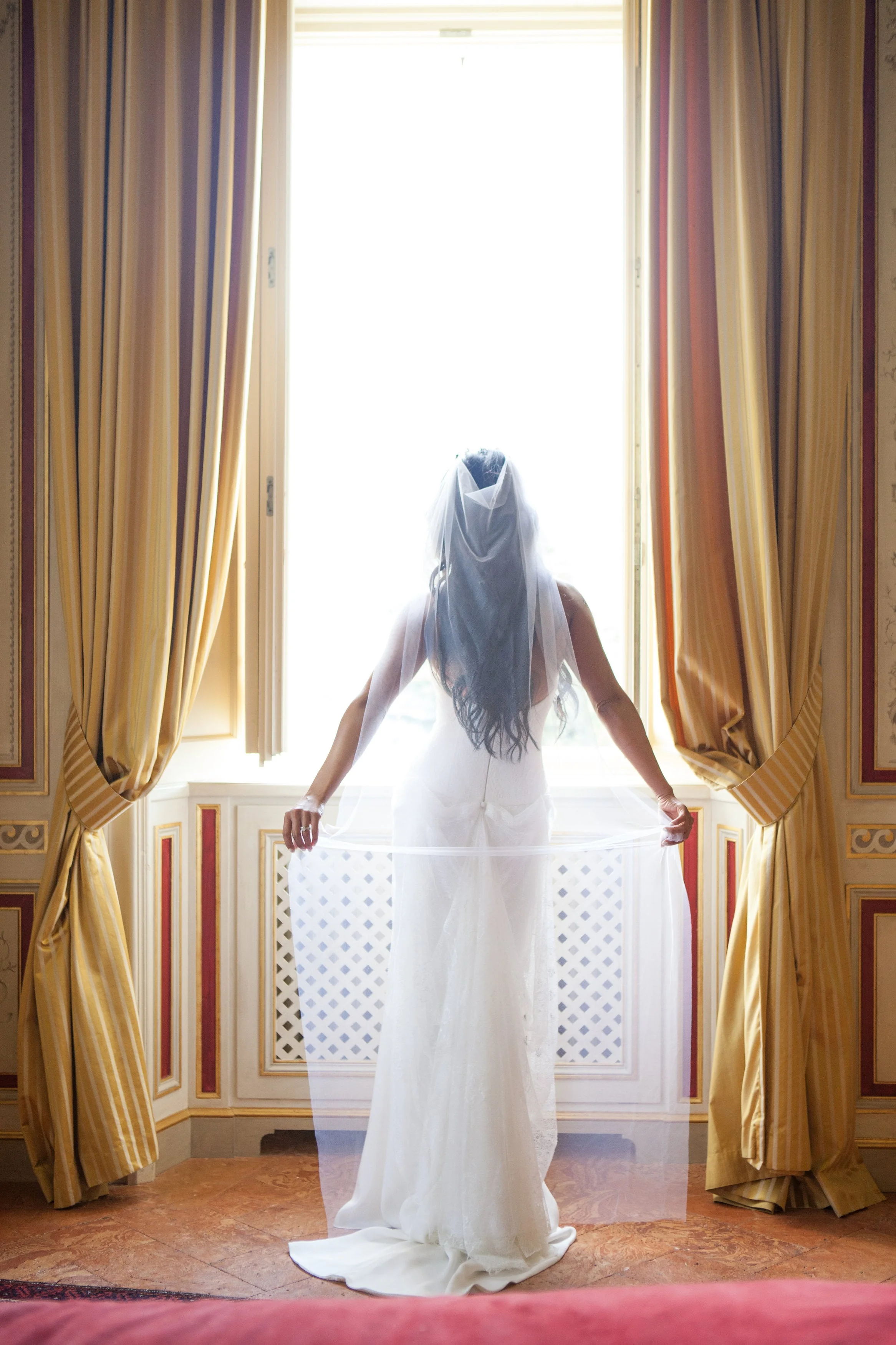 Nelly An wearing a Montacute Veil - Floor length with white tulle and raw edge finish