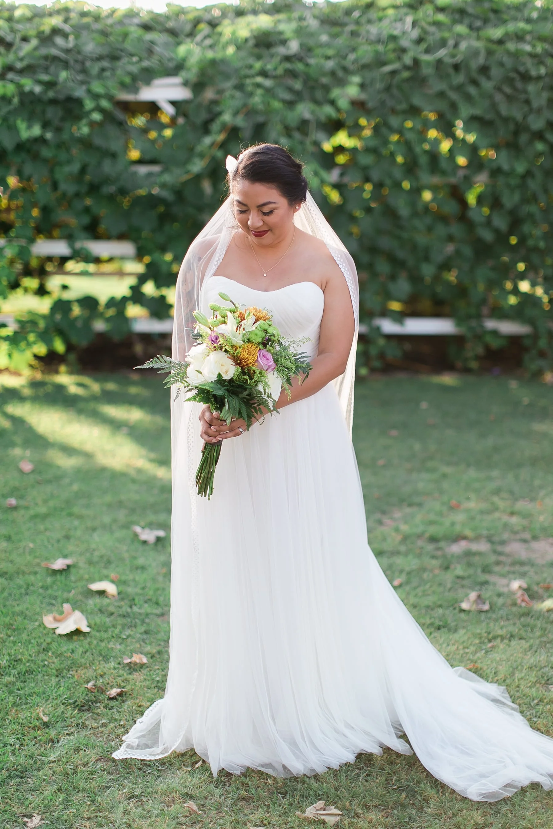Rocco wearing a Classic Veil - Ivory finished with custom spotted lace edge