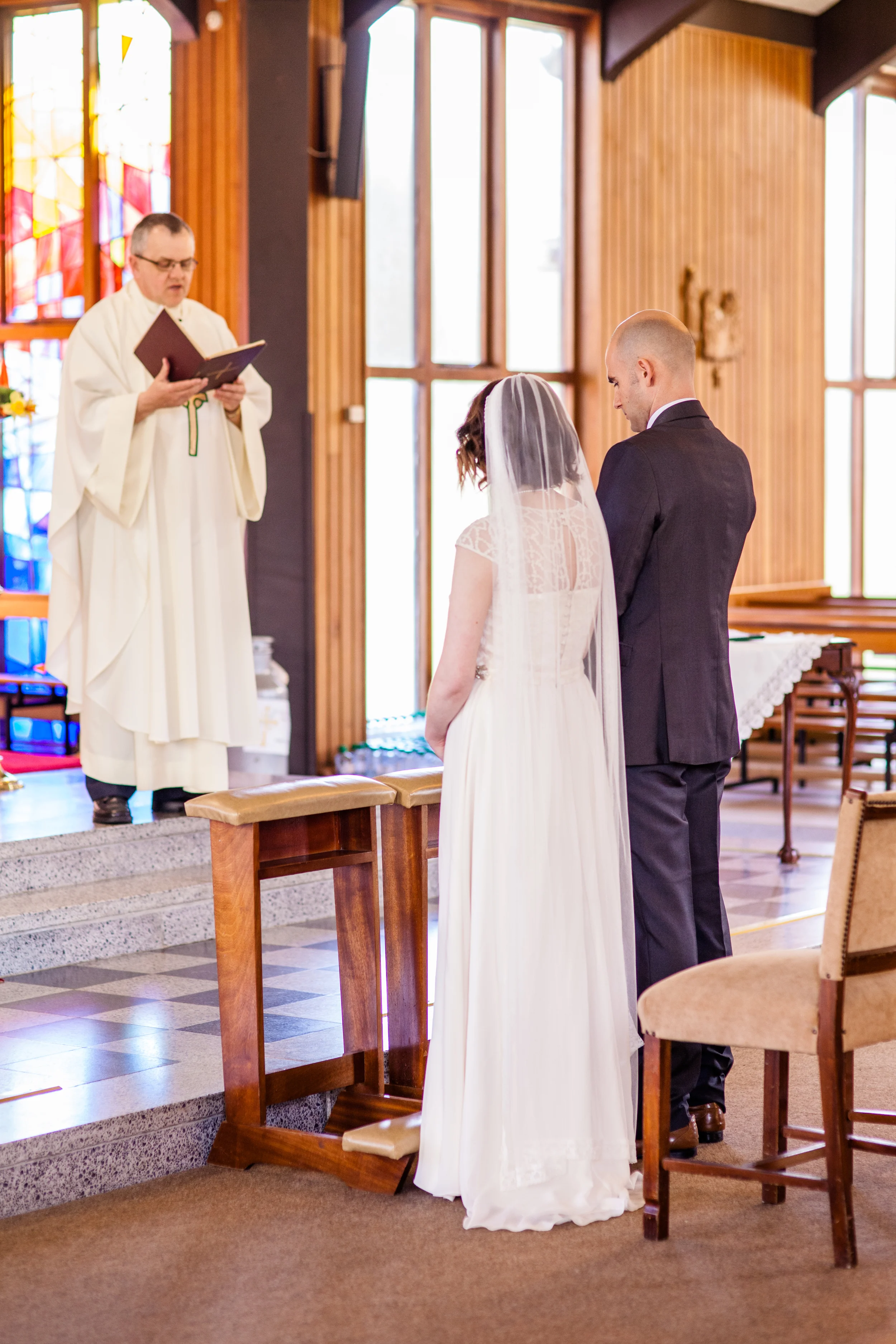 Catherine wearing a classic veil - floor length ivory veil with Somerville lace edge