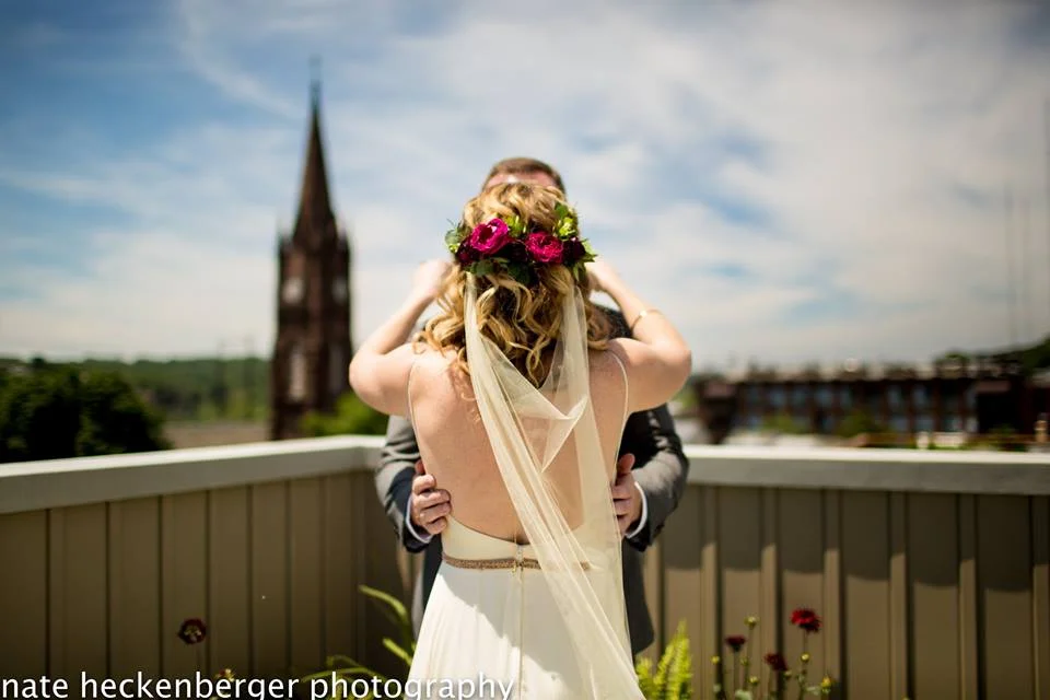 Jess wearing the Oxford veil - A lower back length drape champagne veil