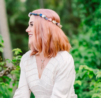Helen wearing the Bainbridge Crown - multicoloured floral crown made from parchment and artificial flowers and berries Photograph by Gus Mank http://www.gusmank.com