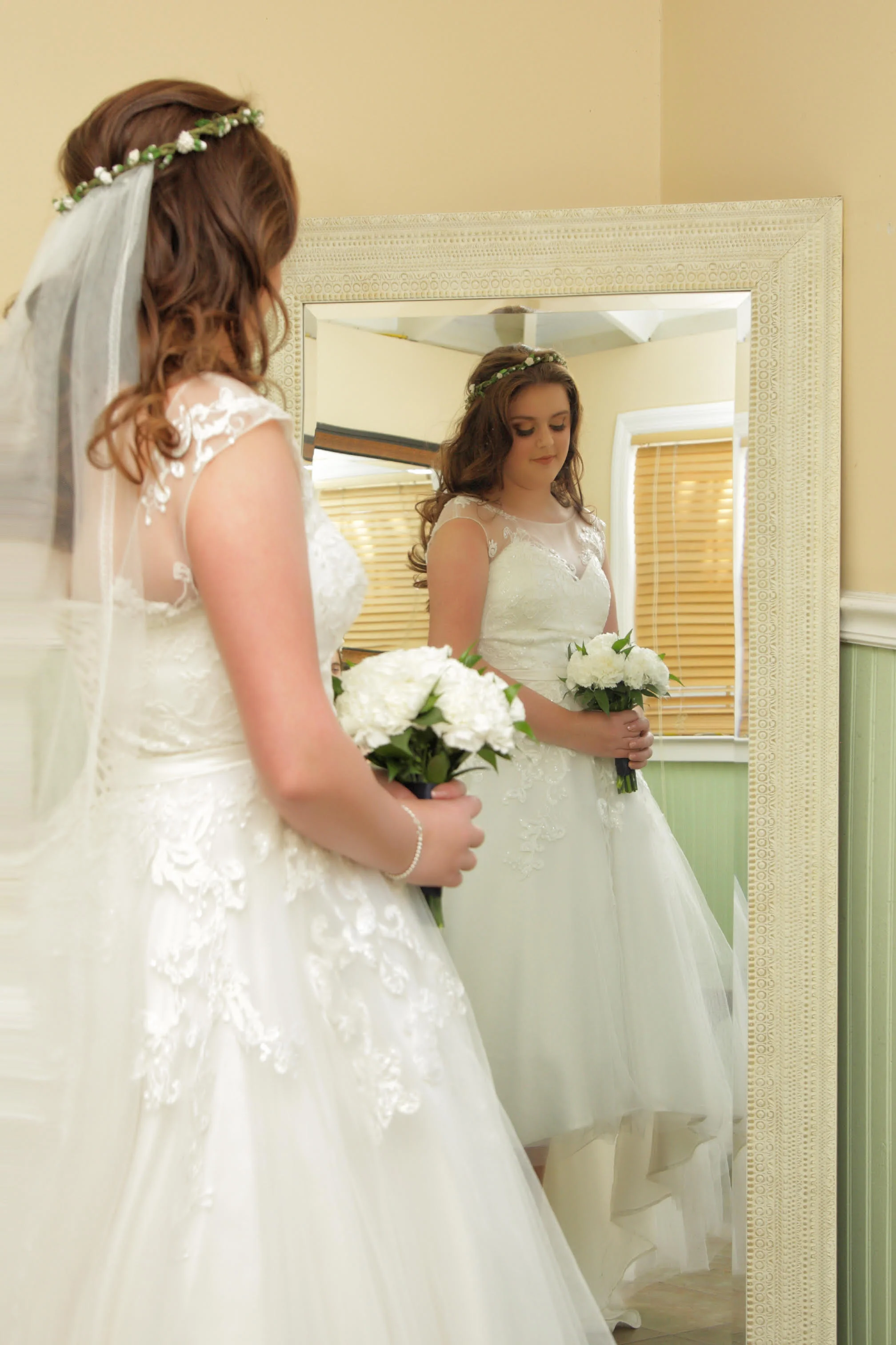 Rachel wearing the Yorkshire crown and veil - Rustic crown with parchment flowers and a detachable floor length ivory veil finished with the oriel lace edge