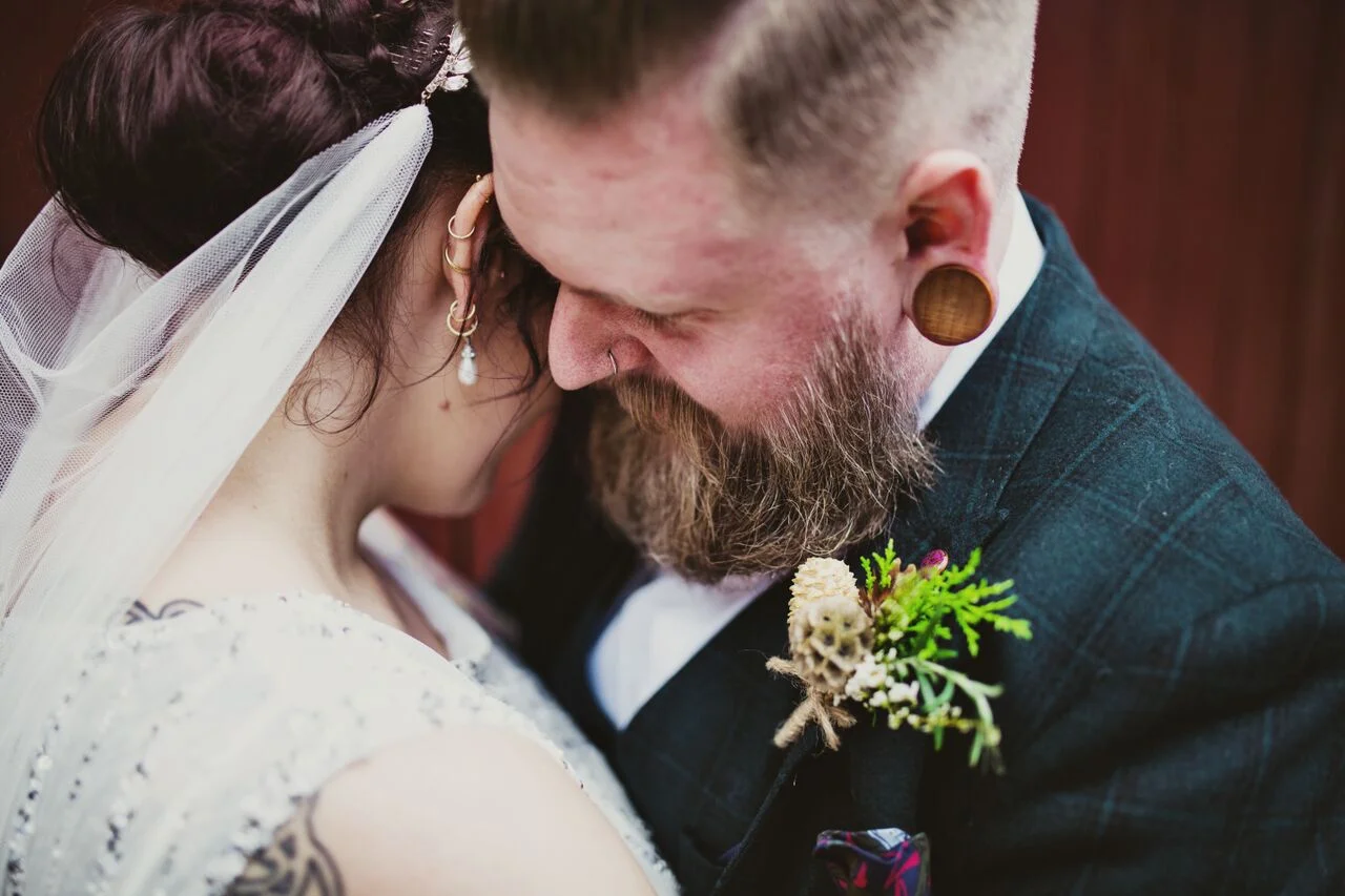 Emma wearing the Hampshire veil - Drape veil with two glass bead leaf combs and ivory detachable veil Photograph by Lisa Jane Photography at http://www.lisajane-photography.com