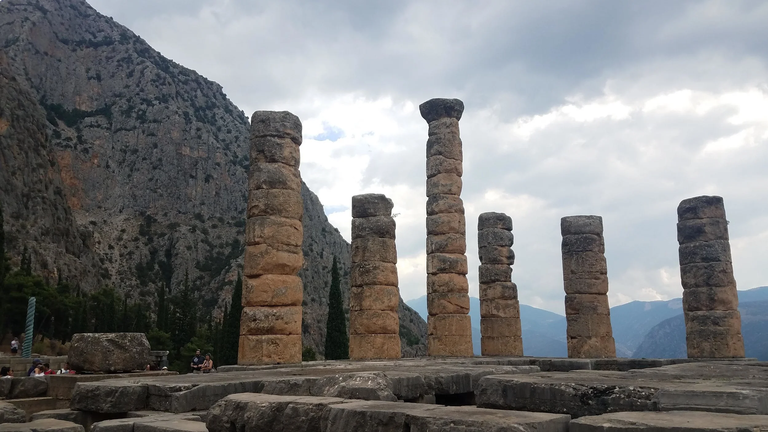 Ruins of the Oracle at Delphi (or Temple of Apollo), where for centuries Greeks would pilgrimage to seek answers to their life problems… And a “conduit to the gods” who was under the influence of heavy incense would answer in nonsense terms, which were then translated into a mysterious and non-specific declaration by a team of priests, and which was then left to interpretation entirely by the recipient.