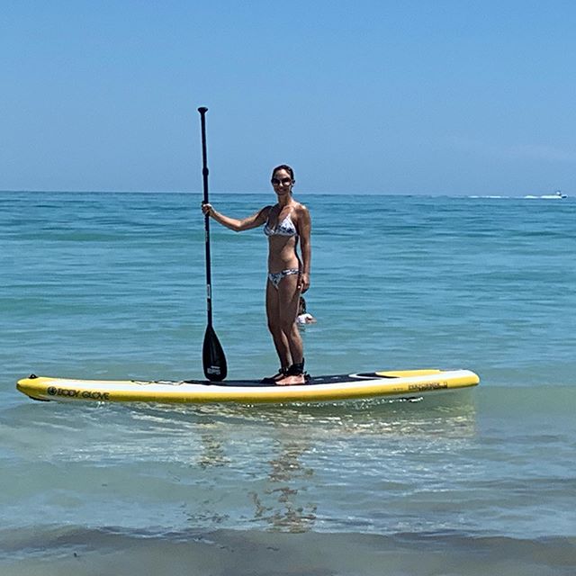 This is how I find #balance. JUST kidding- I bit it right after this photo. 
Hashtag Thank Gawd I Still Have Teeth. I mean... hashtag blessed. .
.
.
.
.
#OnceYouGoSlack #ocean #fitnessgirl #fitness #workoutroutine #paddleboarding #marketing #advertis