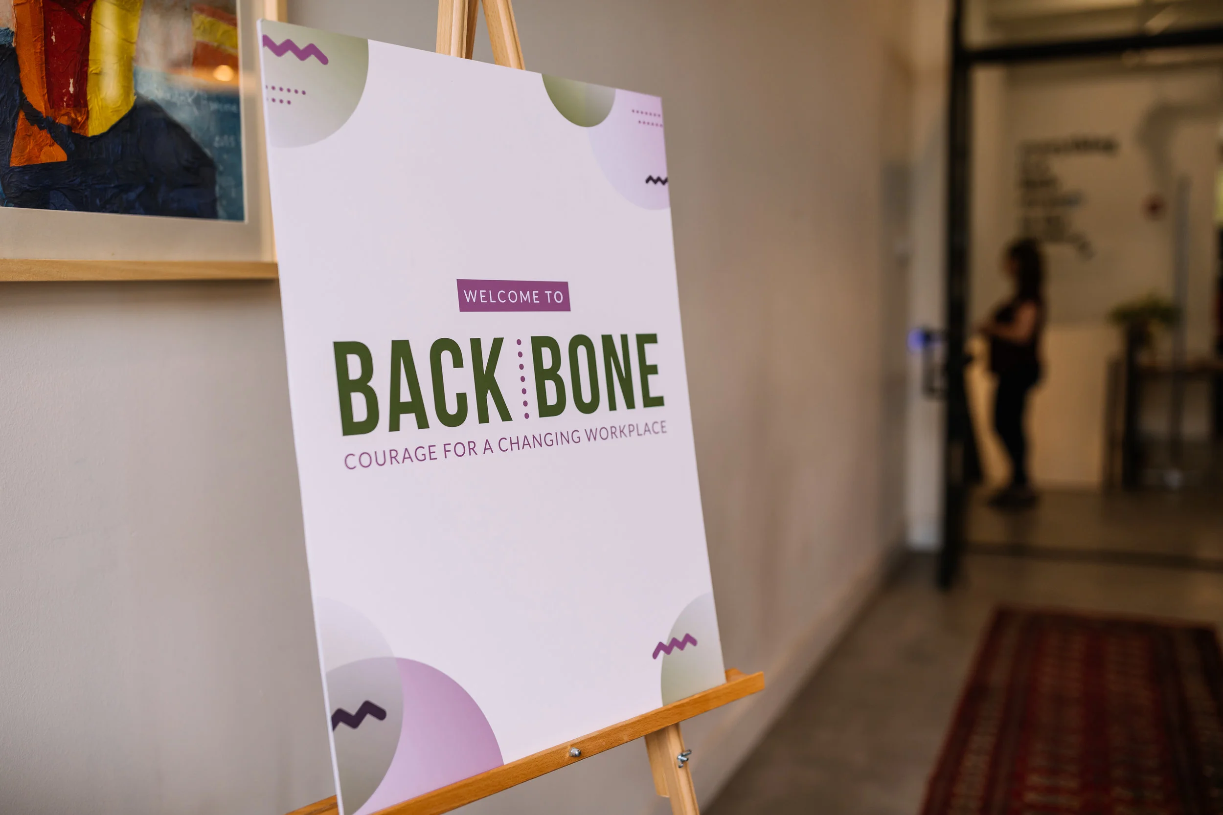 For Backbone: Courage for a Changing Workplace, we created consistency by using the visual identity and brand colors across all materials. 