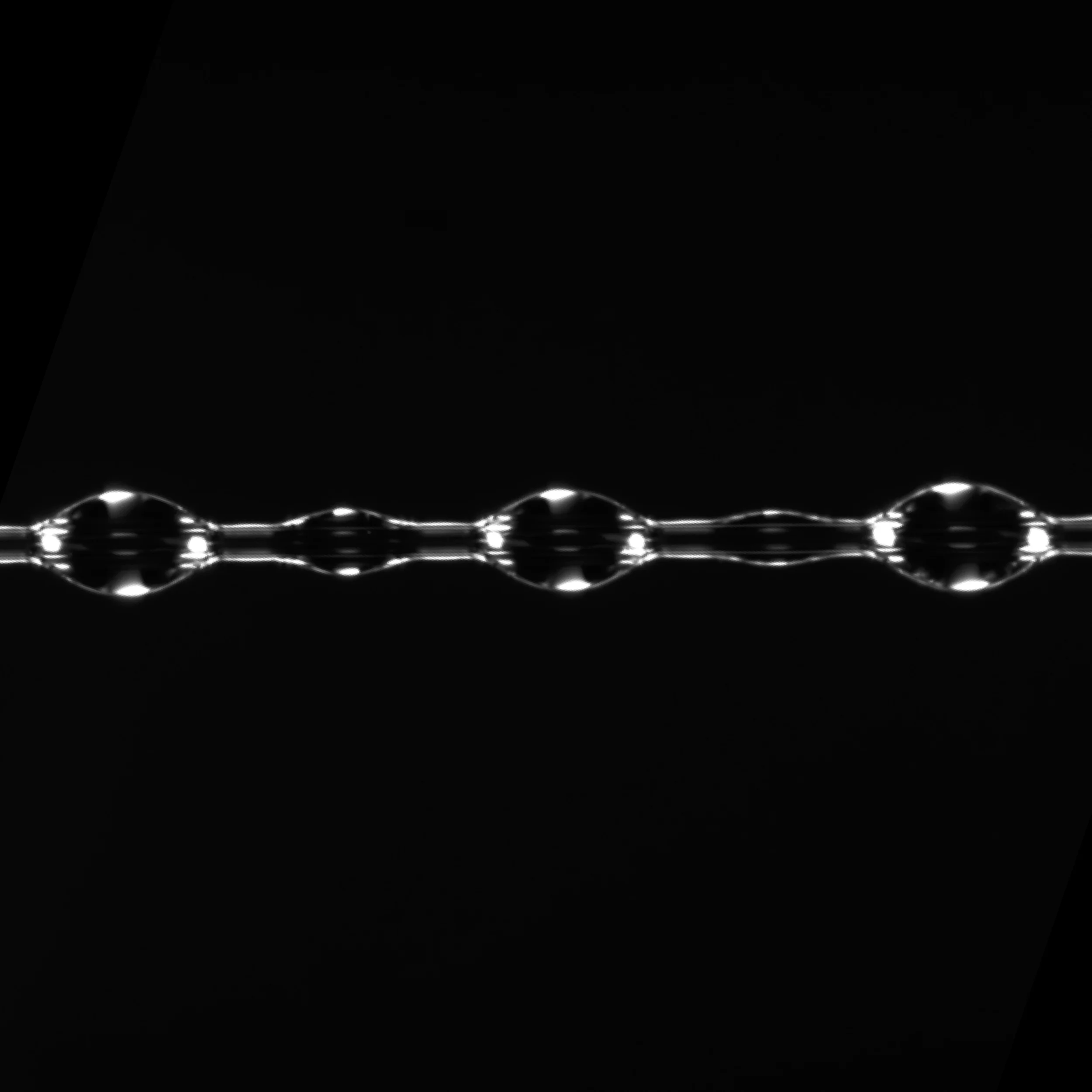 Plateau-Rayleigh instability of polymer coating on a glass fiber