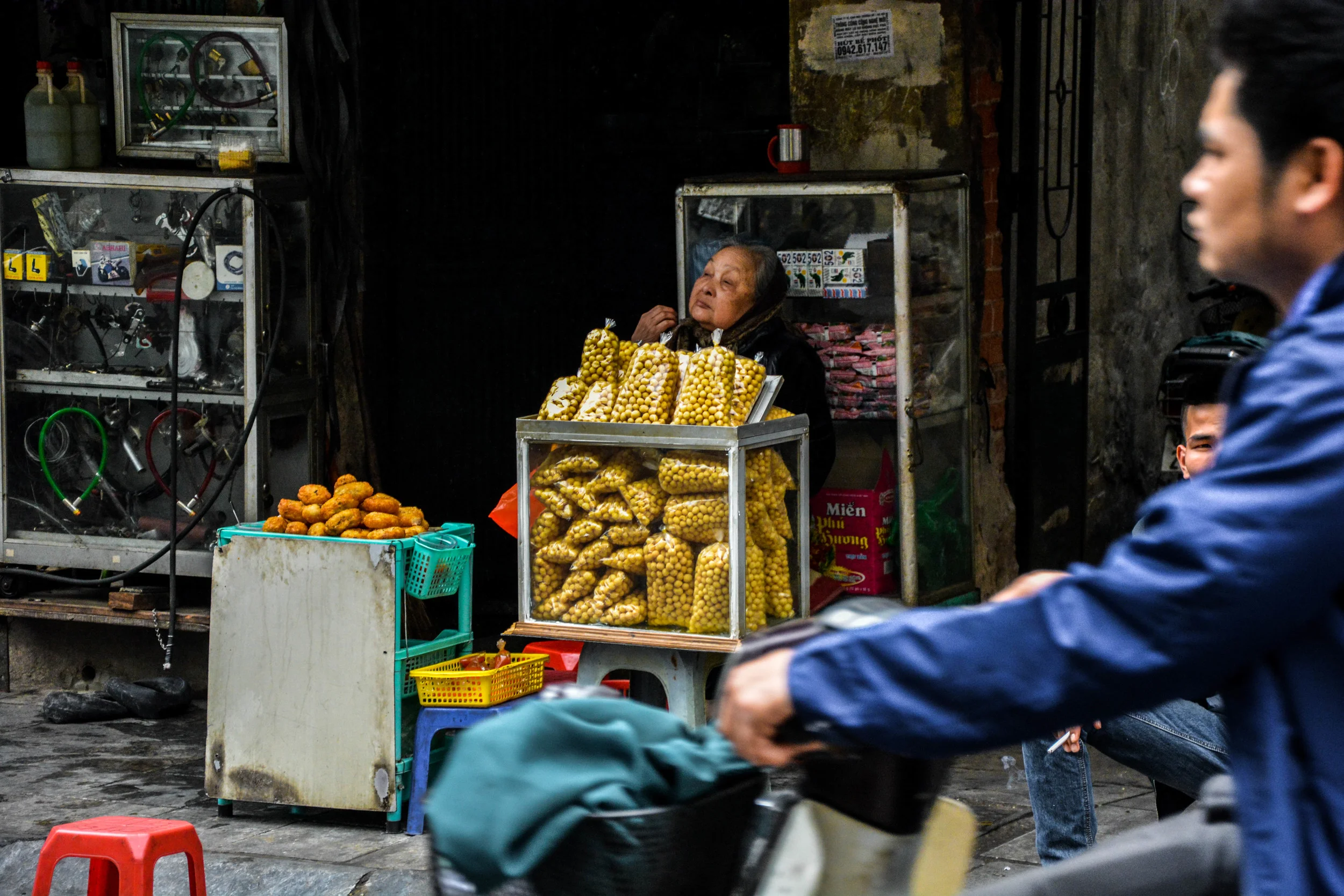 Old woman waiting for customers.