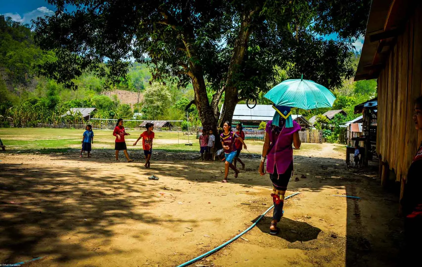 Woman walking under an umbrella