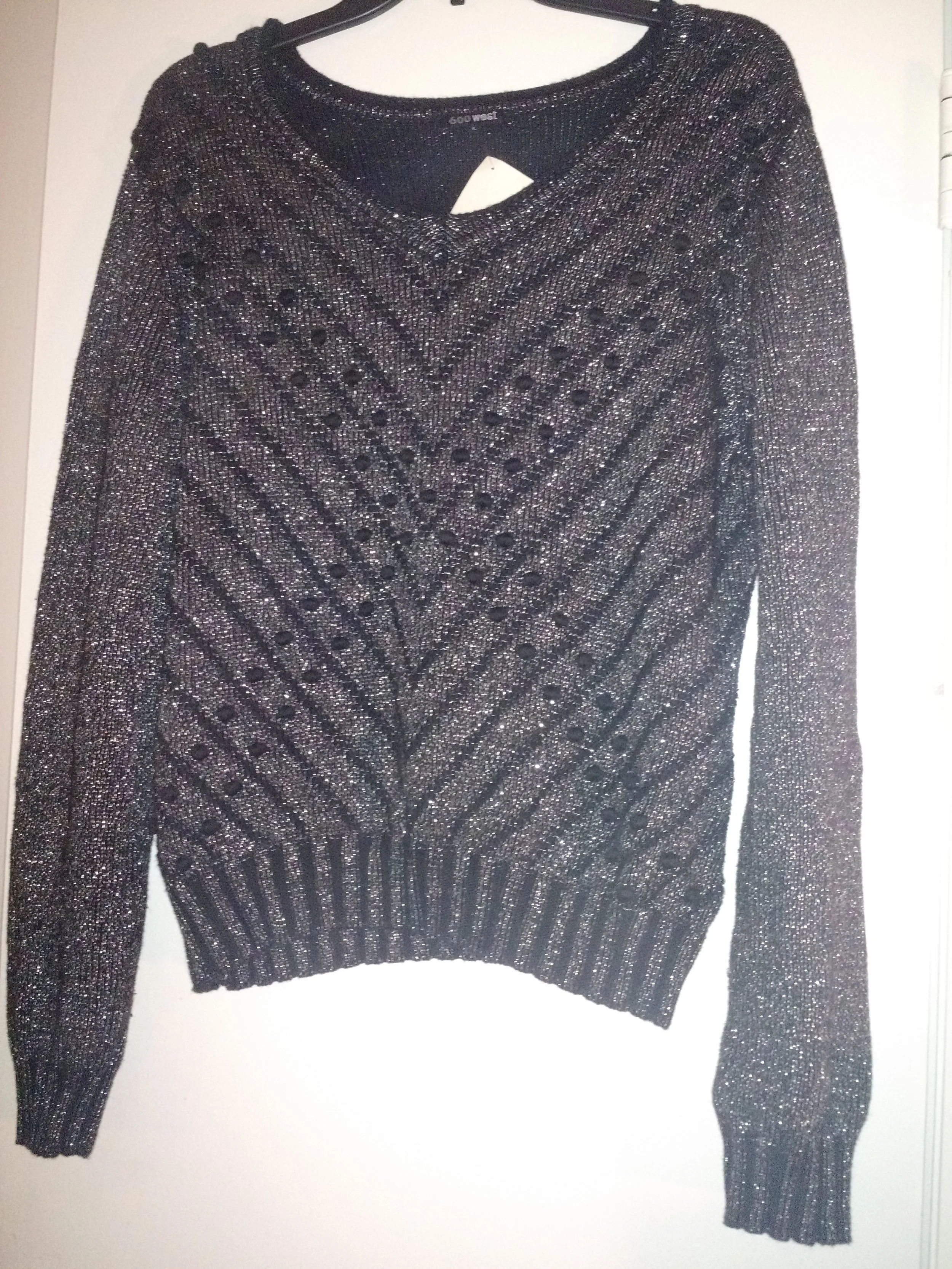 Another perfect holiday fit. Look at the shimmery threading. My sister hated this one because of the spheres but I think it adds character :) For $3 I couldn't pass it up!