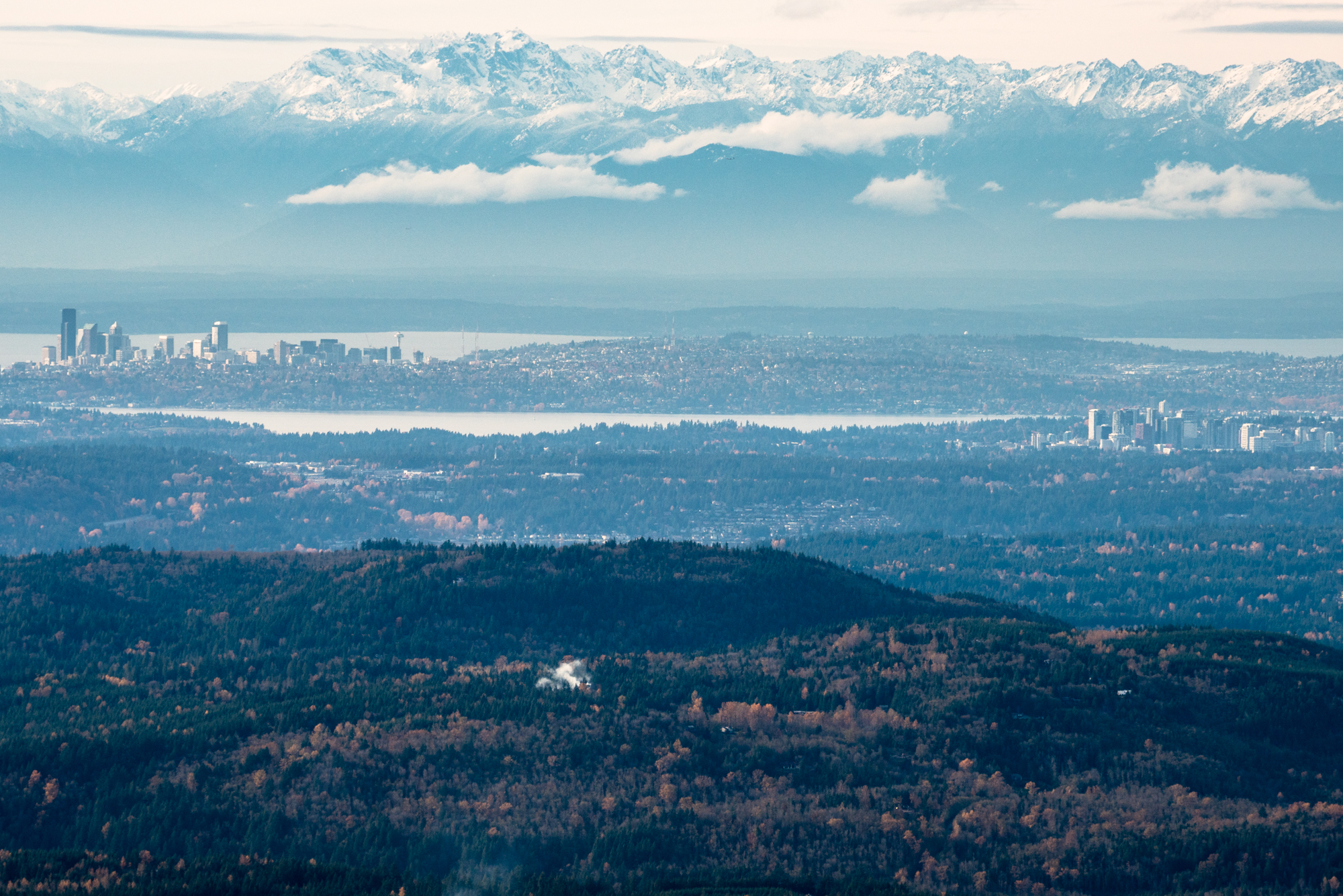 A view of Seattle and Bellvue skylines from the top of Mt. Si.