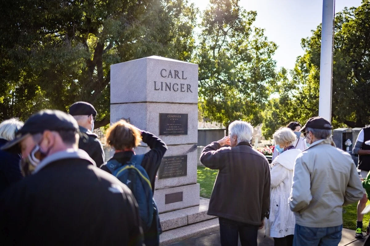 Walkers at the Carl Linger memorial in West Terrace cemetery on the Park 23 Guided Walk. Pic: Carla Caruso