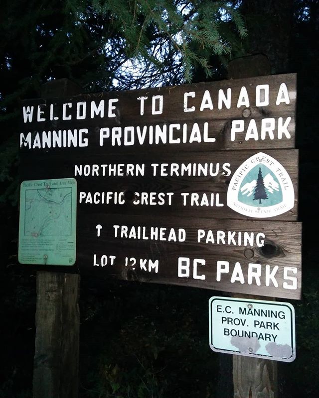 PCT 2014 | Don and I were the last to leave the monument, a little after seven. The sun was down and light was fading quick. One more night hike. Seemed fitting. The 24 miles to the monument that day felt like the quickest of the entire hike; the nine to Manning seemed to be the longest. At first it was surreal – we’re... in Canada. After 5 months, we're... here now – but soon it was just tiresome. The trail wasn’t nearly as well maintained as the section from Rainy Pass to the border - which the North 350 Blades keep in impeccable shape - it was dark, and we were fighting the effects of all the celebratory libations other hikers had shared with us.
I felt, well, neutral. On the one hand, relieved to be finished. My body was wasted and the wet&cold had been eating at me. But I felt like I was about to lose so much of what I loved. I still thought Yo-Yo hikers were nuts, but for the first time I sort of understood the desire.
Eventually the trail meets a road. There is signage for Manning Park Provincial Park. The skies were clear as an alpine lake and the stars bright and uncountable. As we strode up the resort, we ran into our friends leaving the restaurant. The kitchen had closed just before they arrived, and all they were able to get was soda. Crushing. Still, I laughed, realizing I was rapidly running out of chances to say “I walked here from Mexico, dammit!”
We piled into a hotel room, nine of us, missing only SOGO and Juliangelo. The receptionist gave us little cards that read “Congratulations! Now that you’ve made it Enjoy a free drink on us! Just take this voucher over to the Pinewoods Restaurant or Bear’s Den Pub for your complimentary drink.” I bought every bag of chips they had at the front desk, including all-dressed potato chips, which smuggleslightheart had been talking about since I met him. My first time in Canada, after all.
I took a steaming hot shower and laid out some couch cushions on the ground to sleep on. It struck me that my last night sleeping on Trail had passed, but I was too tired to sit with that reality and conked out for a solid ten hours.
📍Syilx (Okanagan) and Nlaku'pamux land
#hikethedivide #PCTig