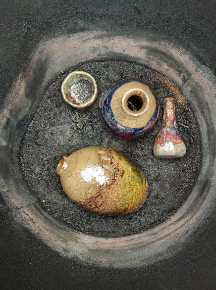 Raku - reduction bin.png