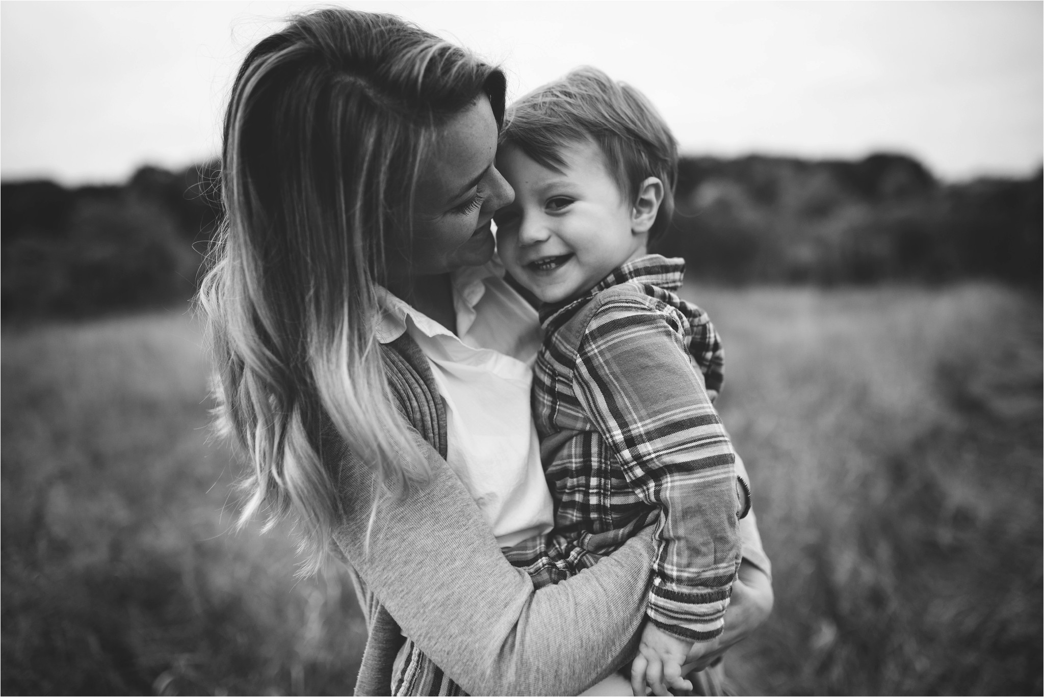 mom and son hugging