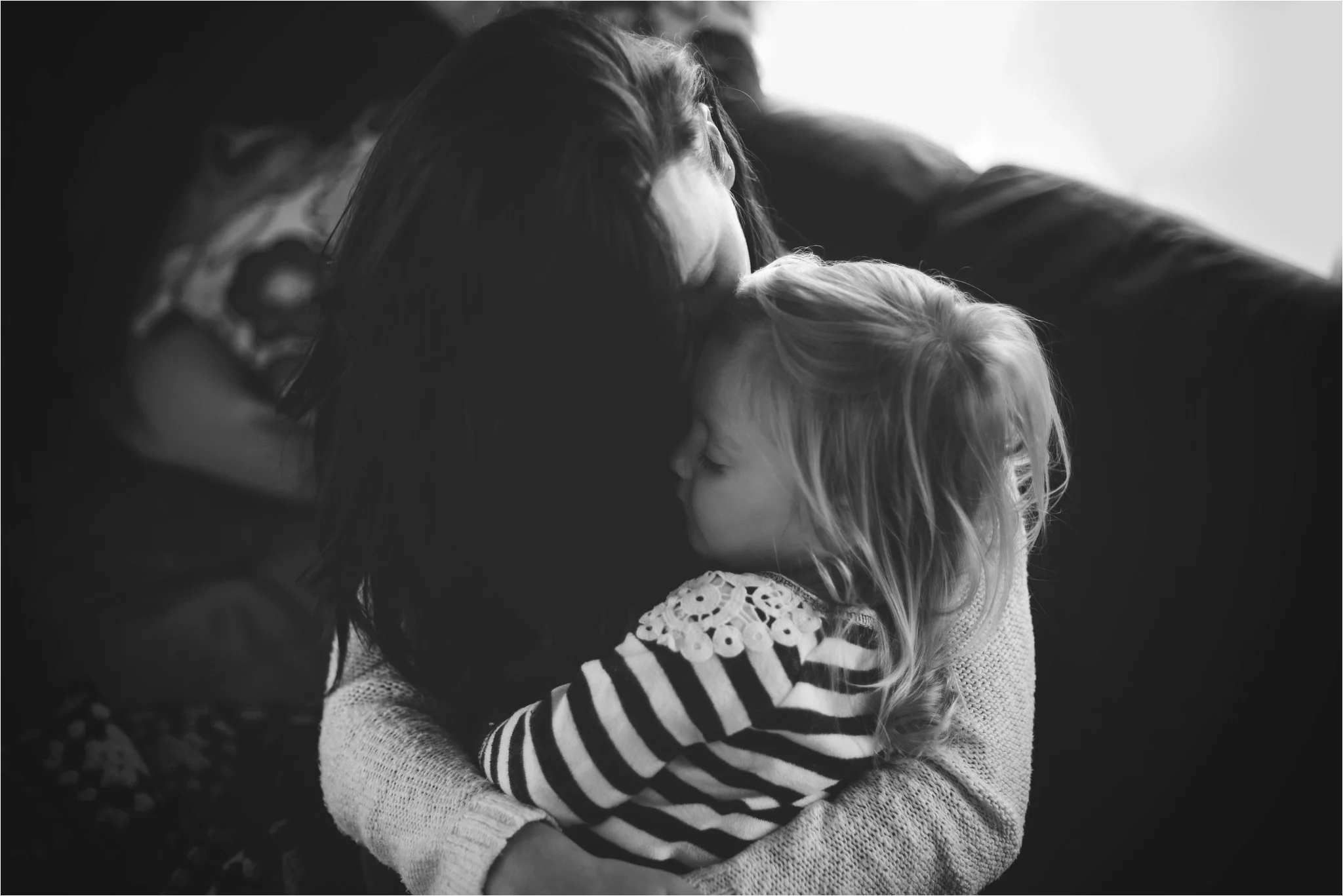 Mom and daughter hugging