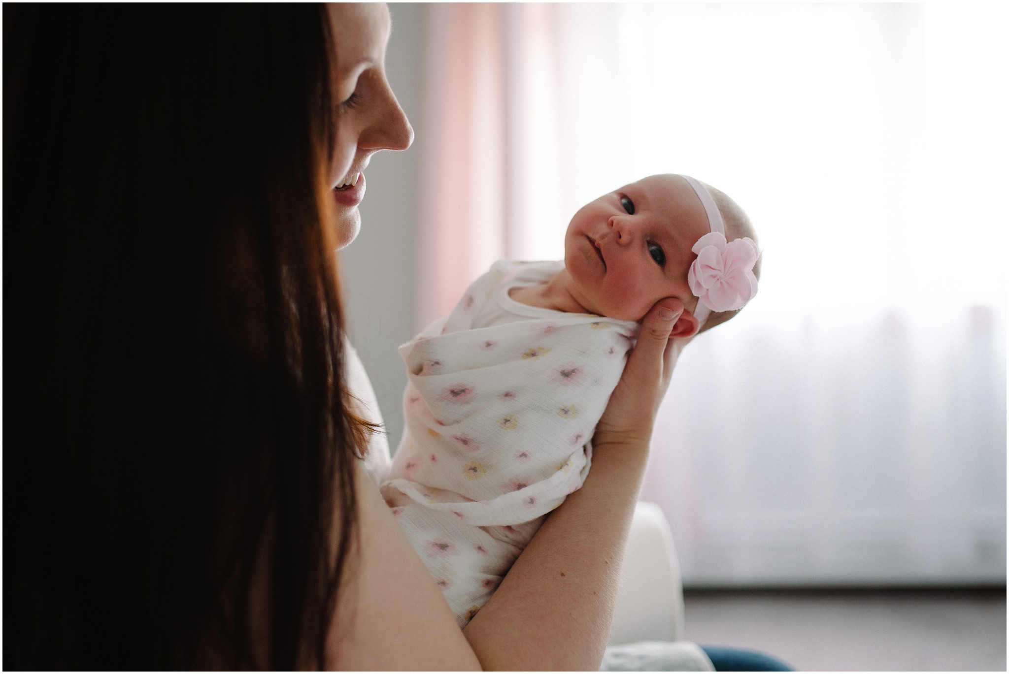 mom holding her baby