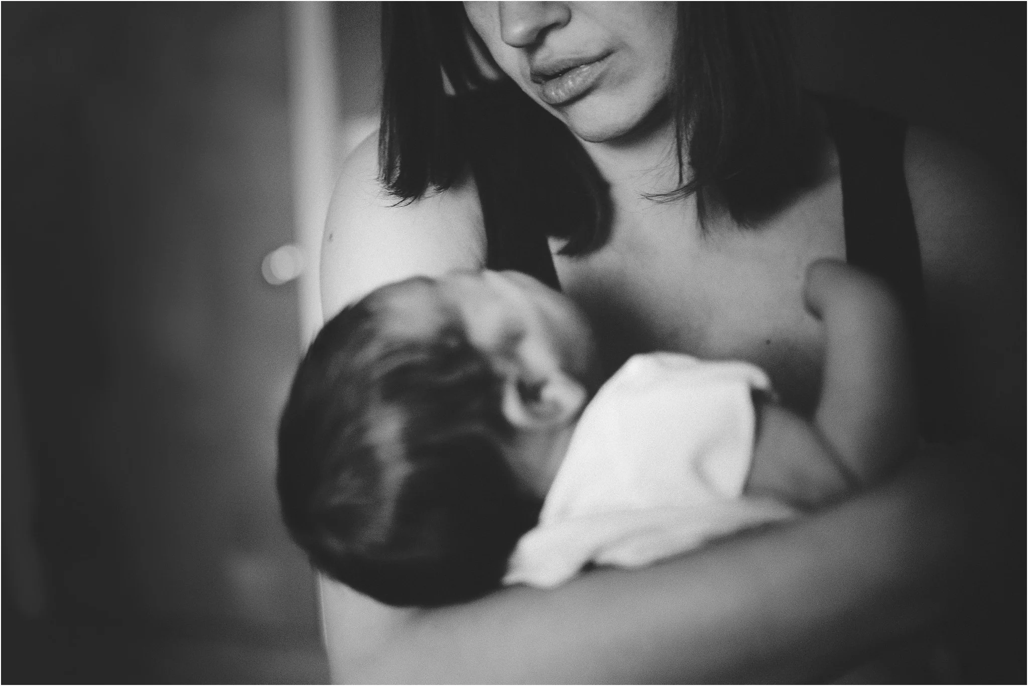 mom singing to baby
