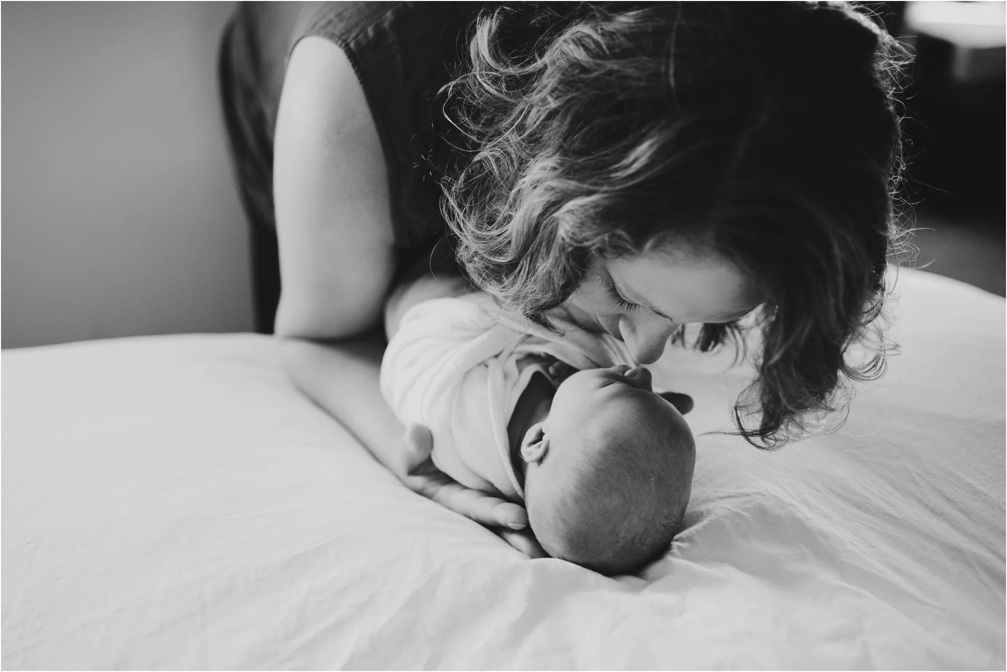 mom and baby rubbing noses
