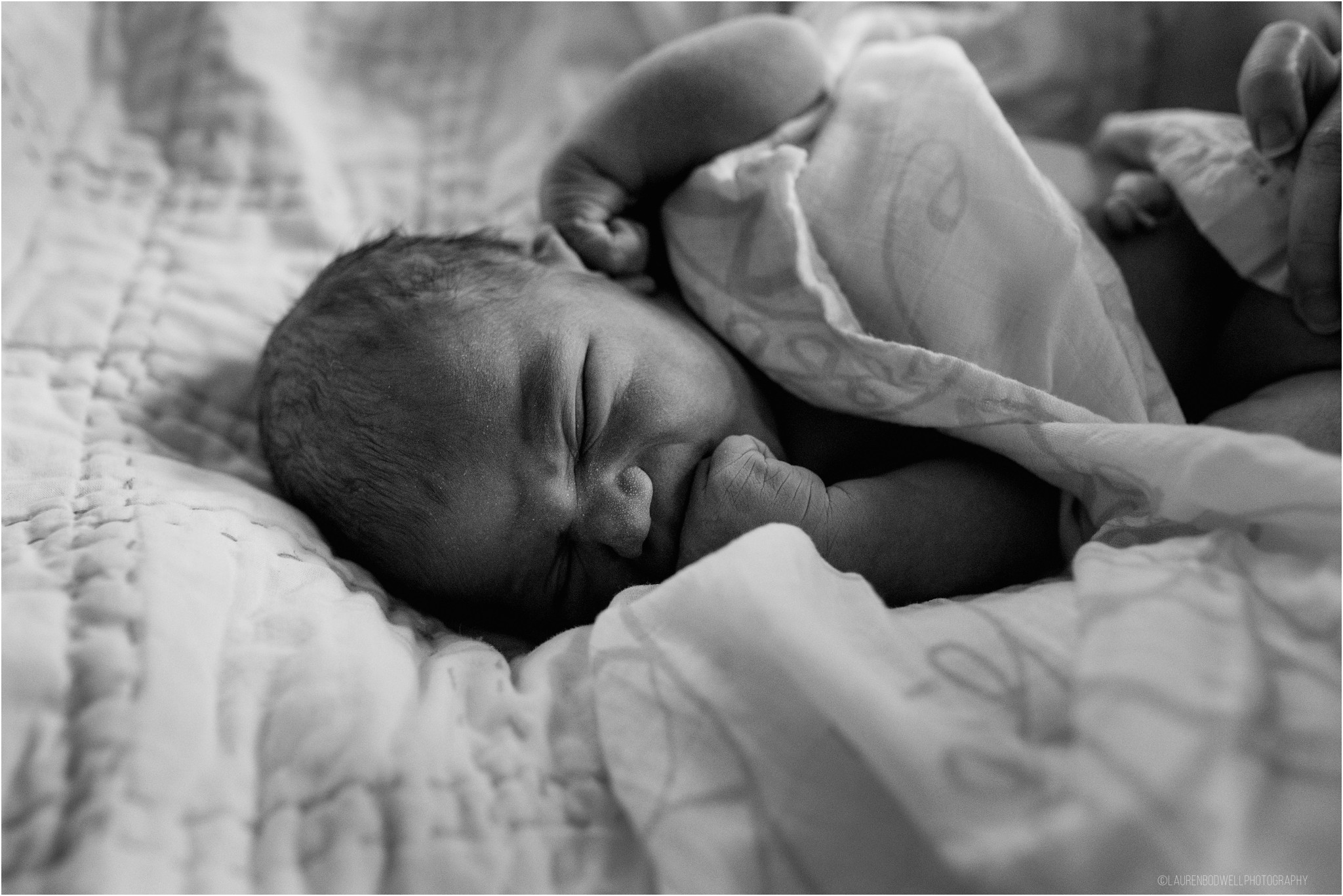 New baby on bed