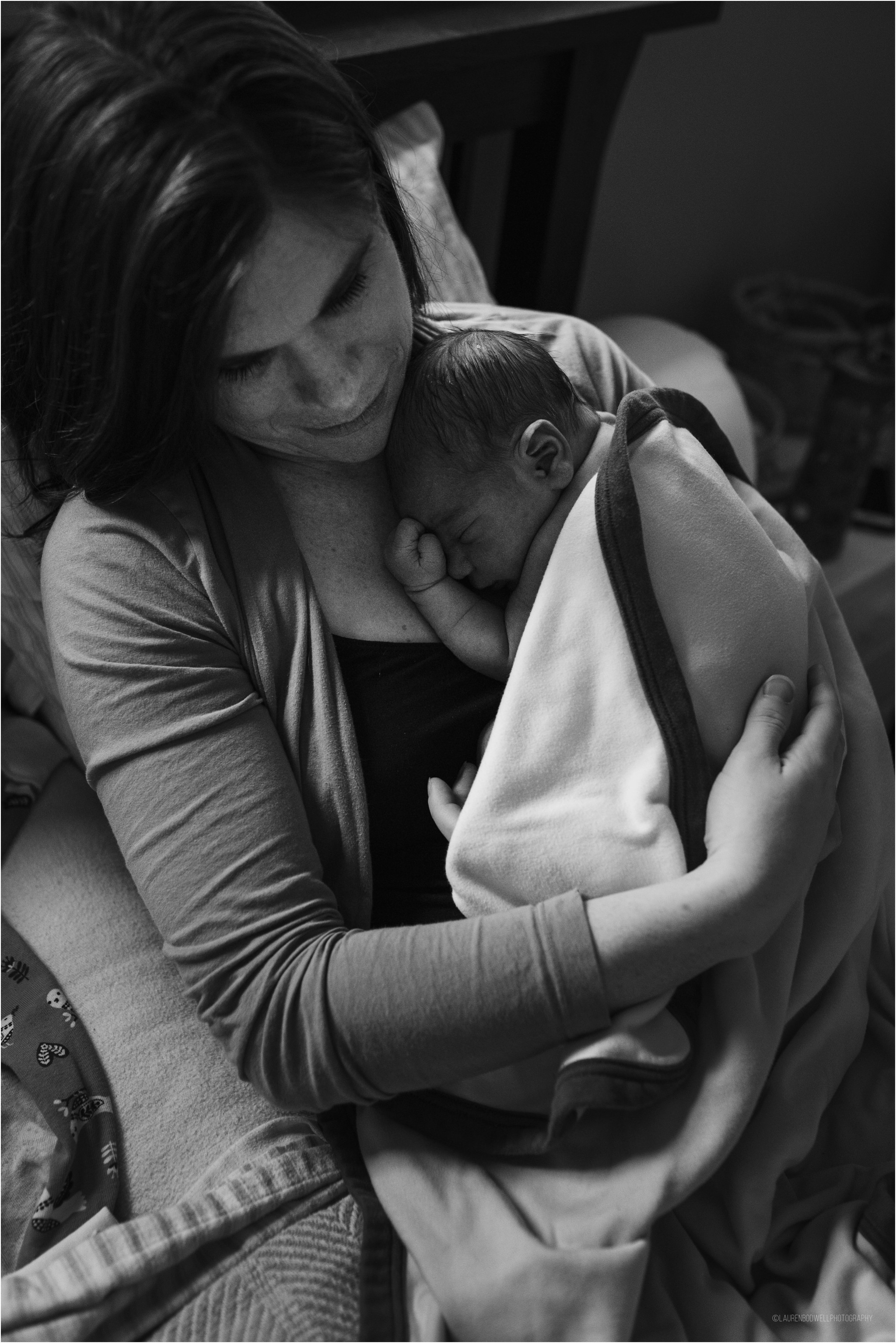 Mom holding new baby