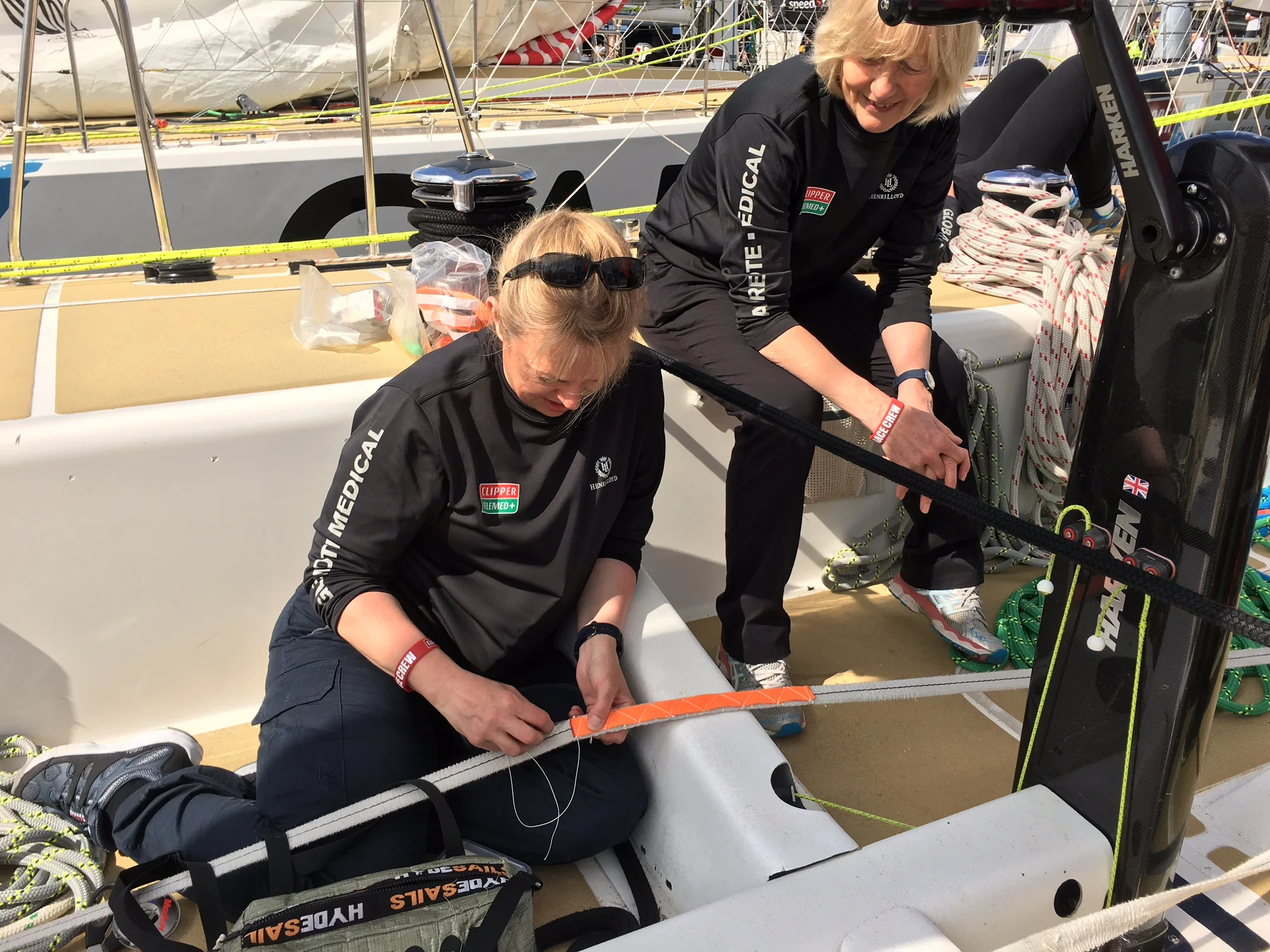 Jane sews chaffing protections onto the jack stays (onto which we clip on).