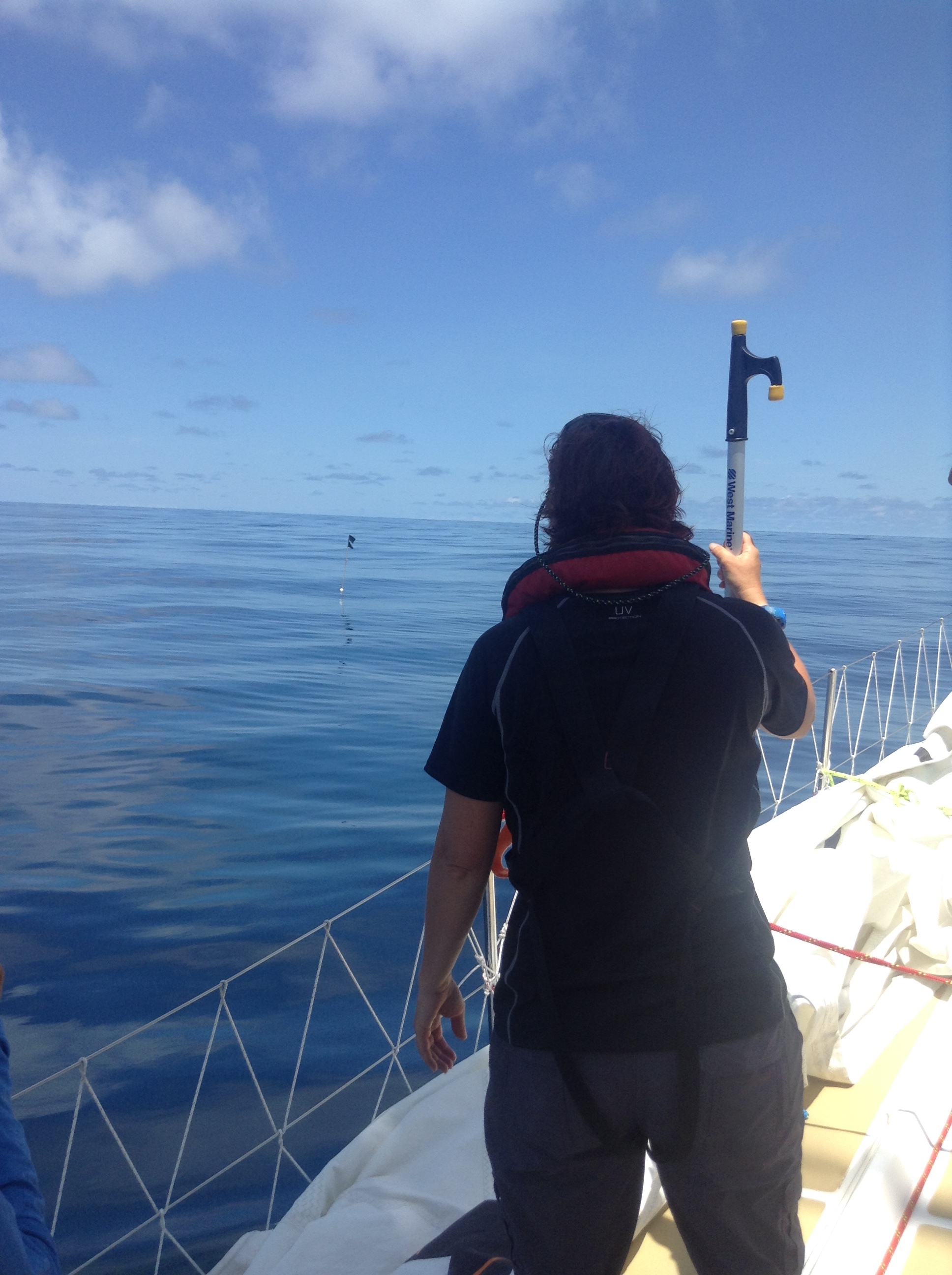 Jenn keeps a lookout on the drift net marker