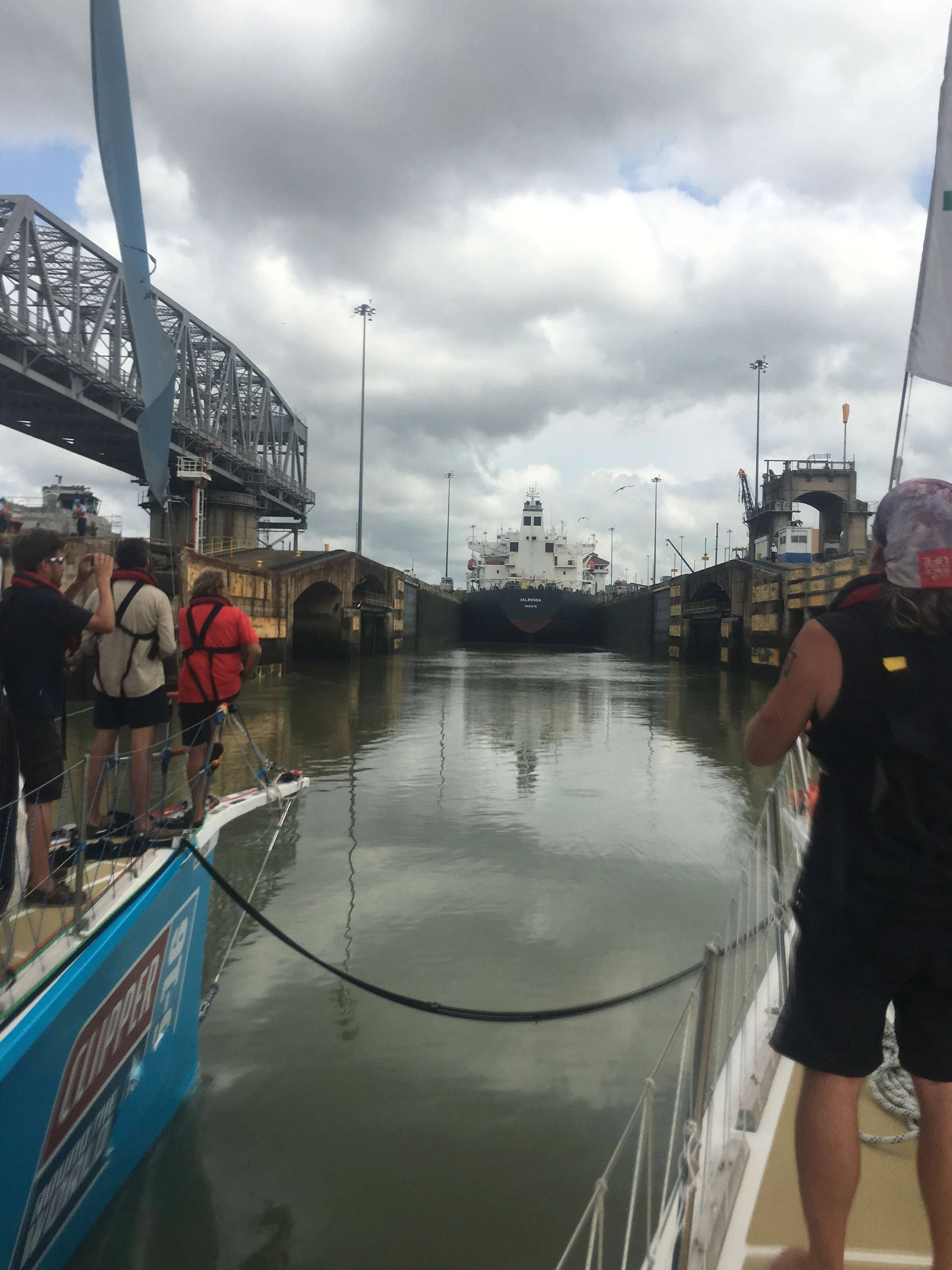 Approaching the canal behind a cargo ship.