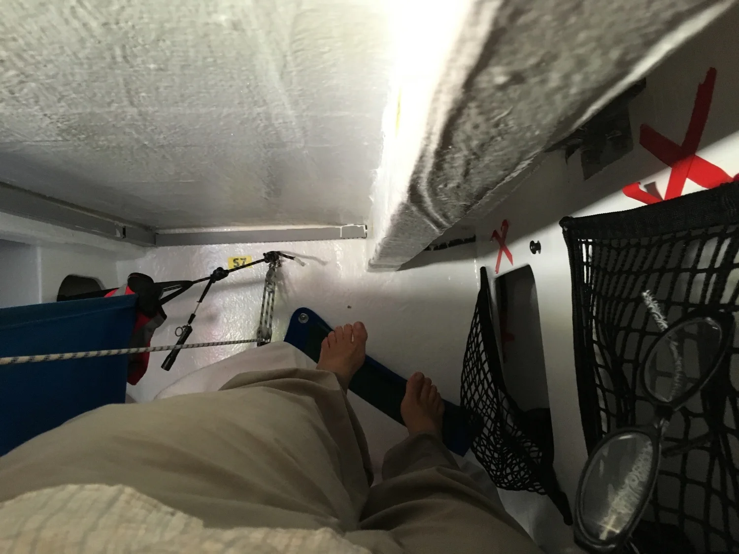 Actually the "roof" is on a slant, and I am flat in my bunk, with the bunk raised on one side and the lee-cloth up so I won't fall out. Now, where did I put my reading glasses?