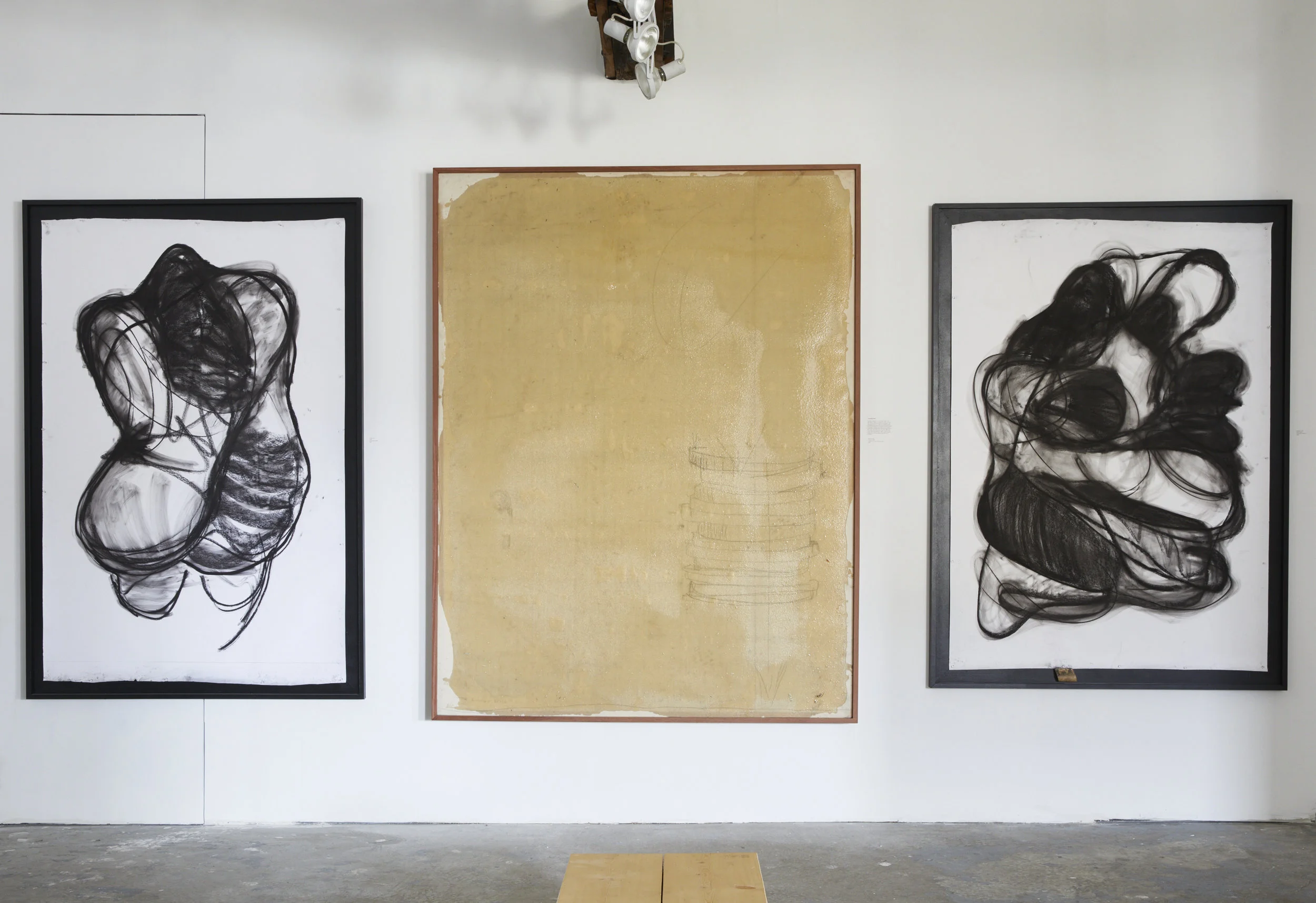 Left to right: "Helen," 2017 Charcoal on paper 78.5" h x 53.5" w "Counting Chips," 2000-2017 Graphite, grit, footprints, epoxy on canvas 85.5" h x 65.5" w "The Couple," 2017 Charcoal on paper 74,5" h x 53.5" w